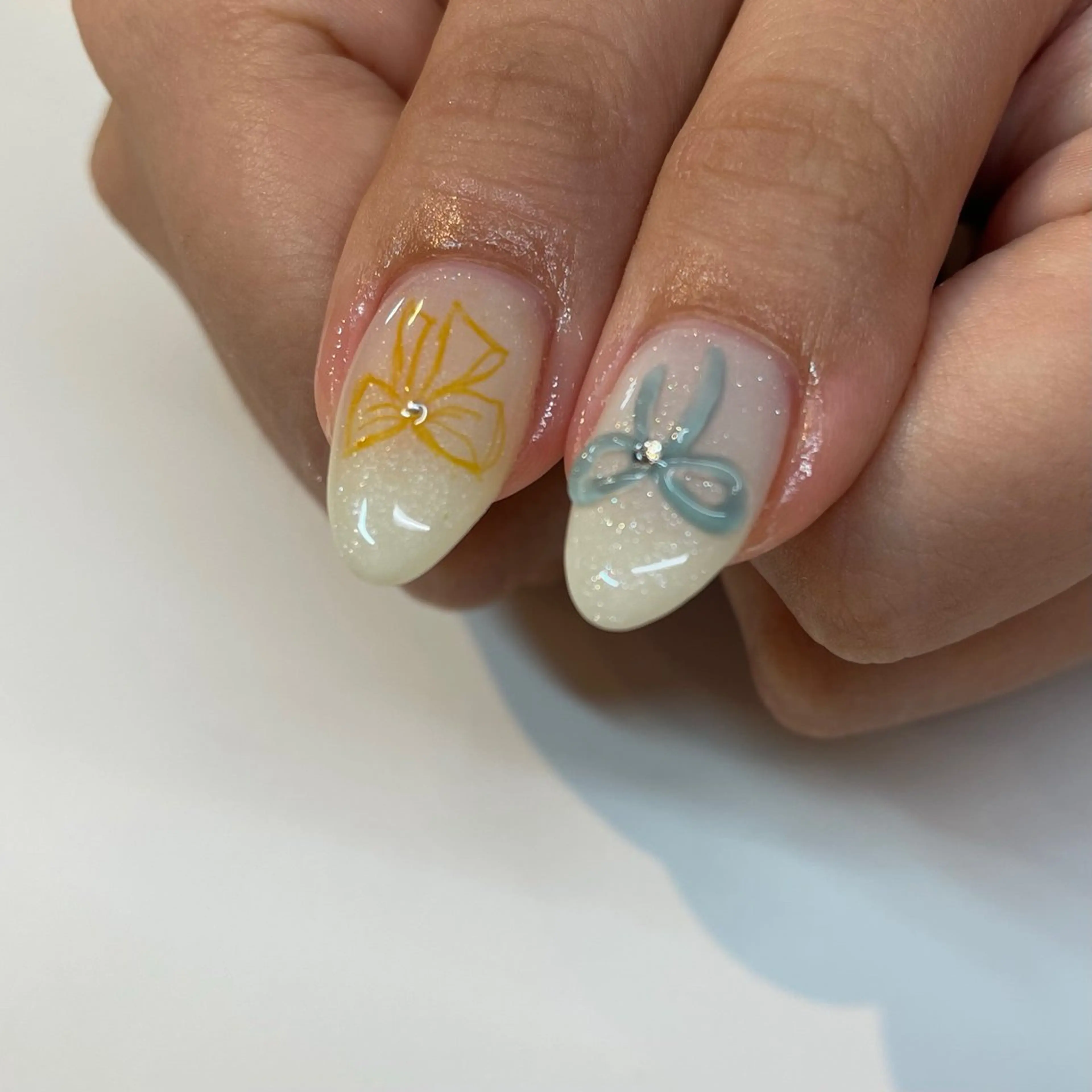 ネイル リボン Manon Yuiのマツエク・マツパデザイン