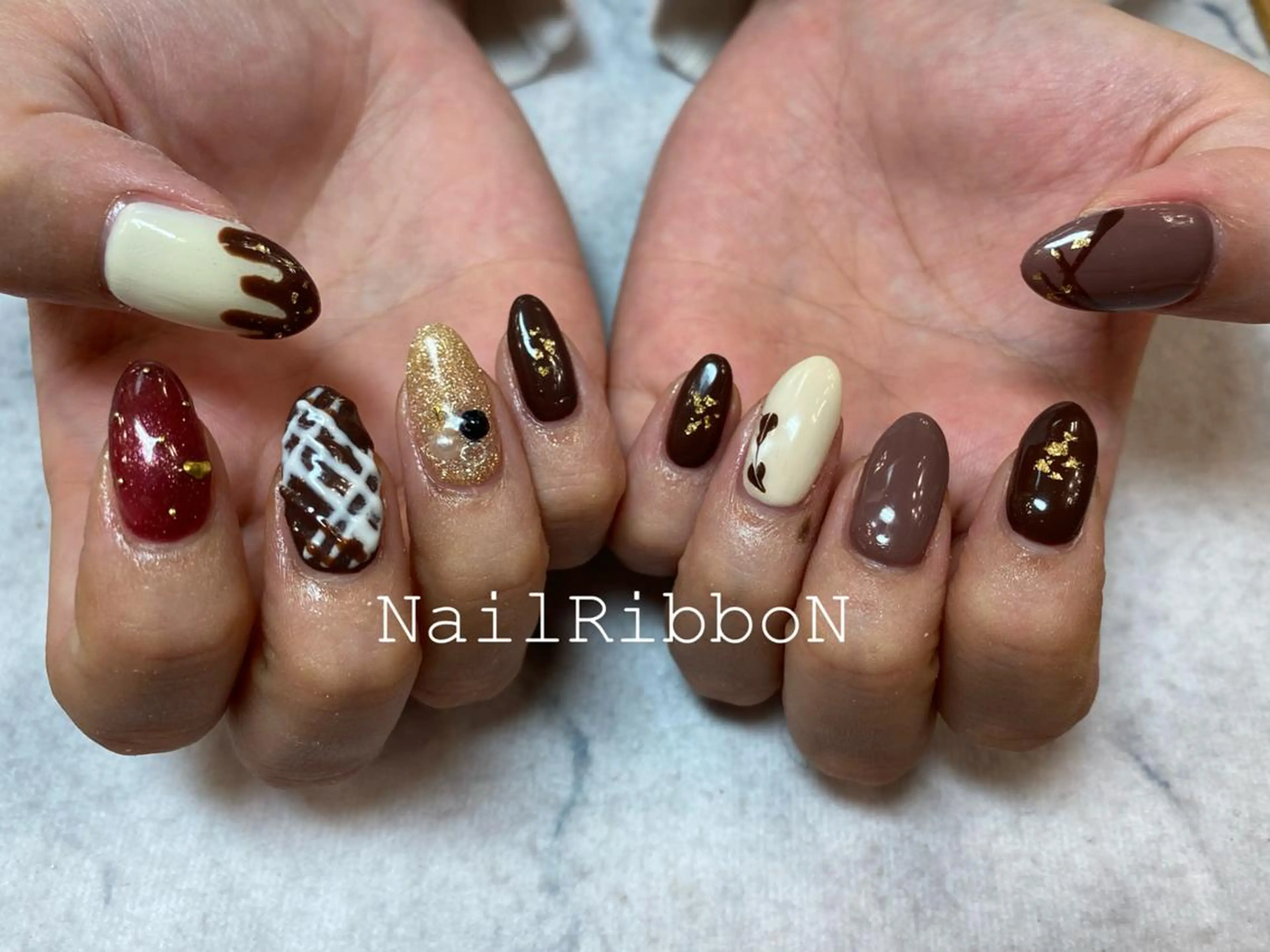 ネイル ネイルリボン 受付スタッフのネイルデザイン