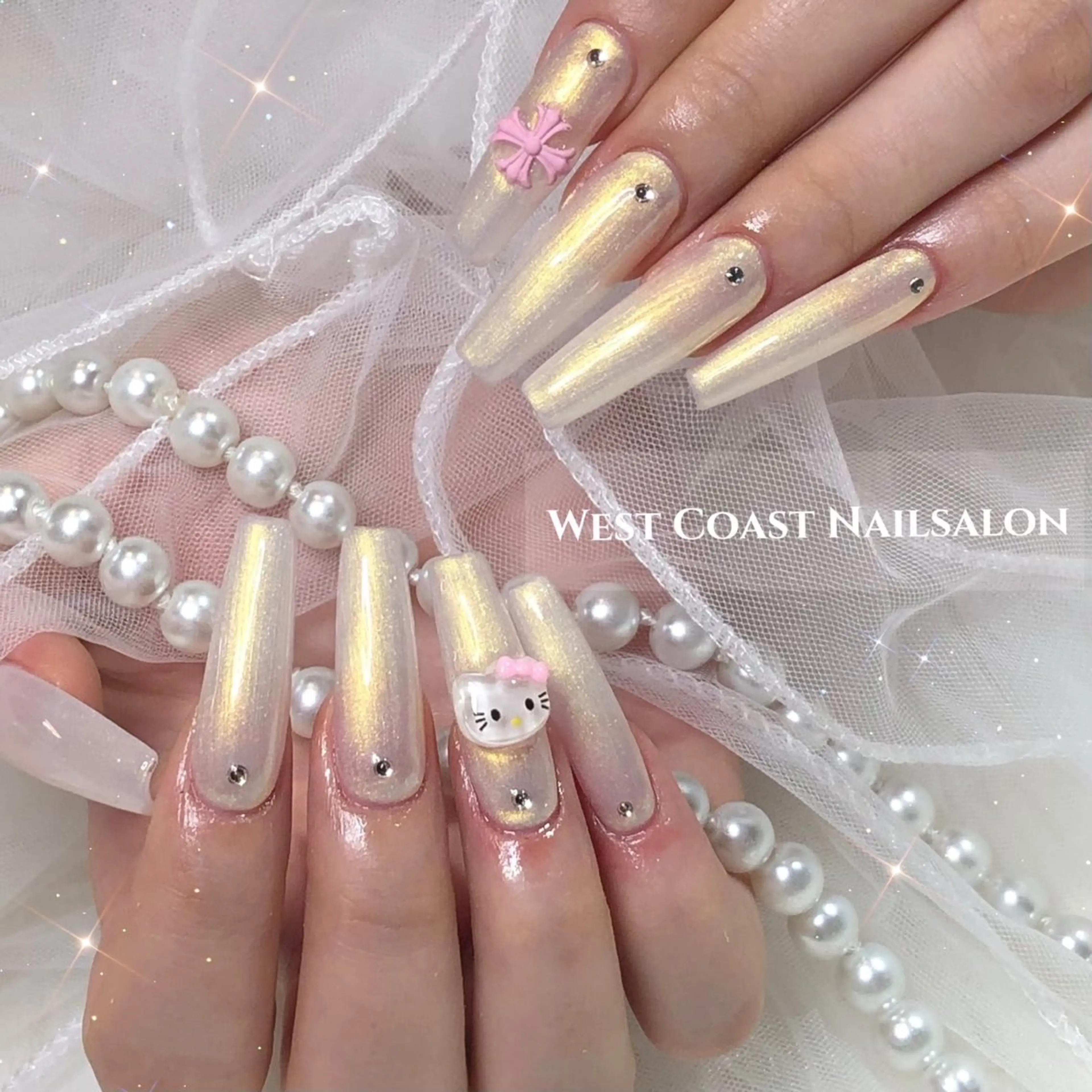 ネイル ハンドネイル ハンドケア リボン、ガーリー パーツ放題専門店のネイルデザイン