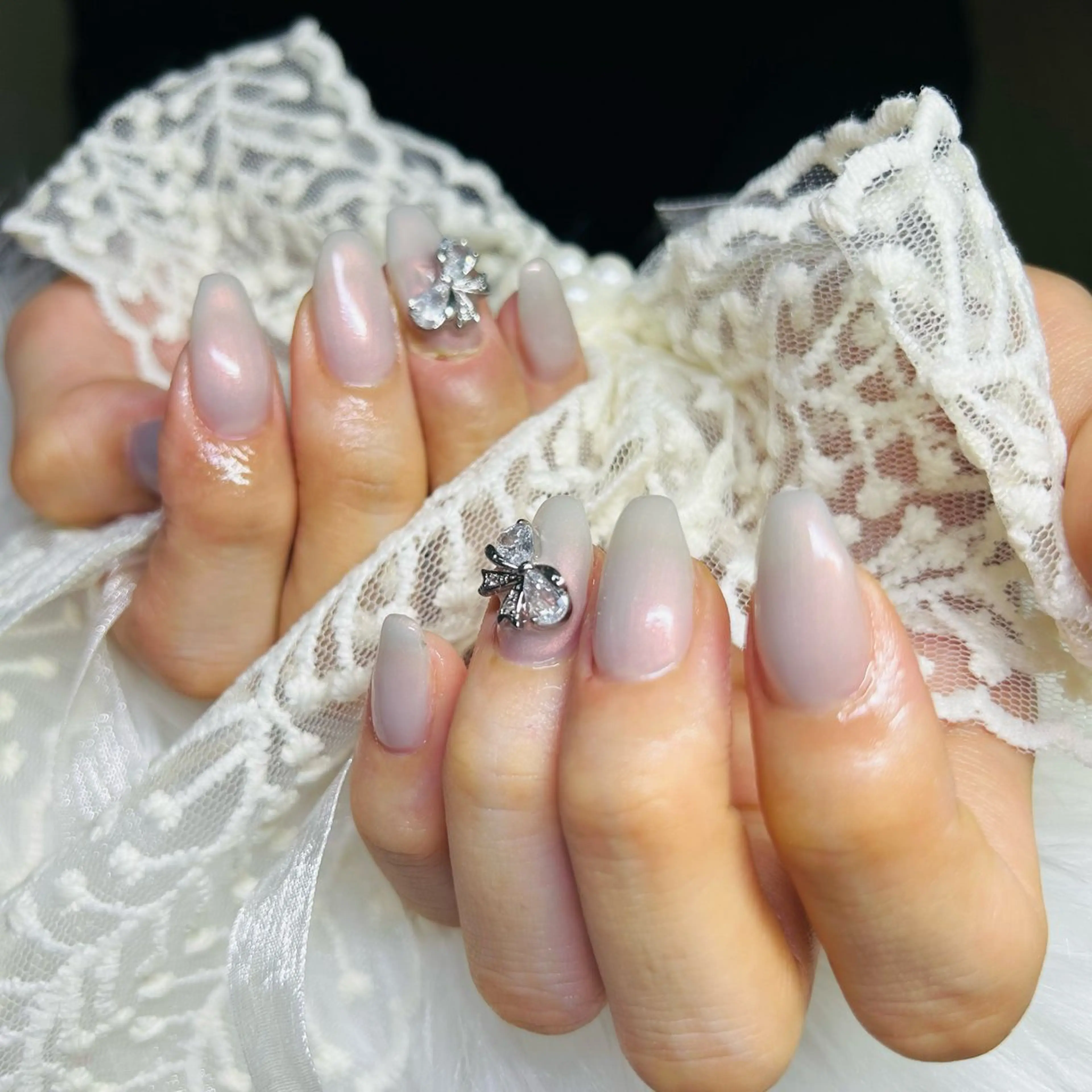 ネイル オーロラネイル ワンカラーネイル リボン EMILY  NAIL所属・EMILY NAILのネイルデザイン