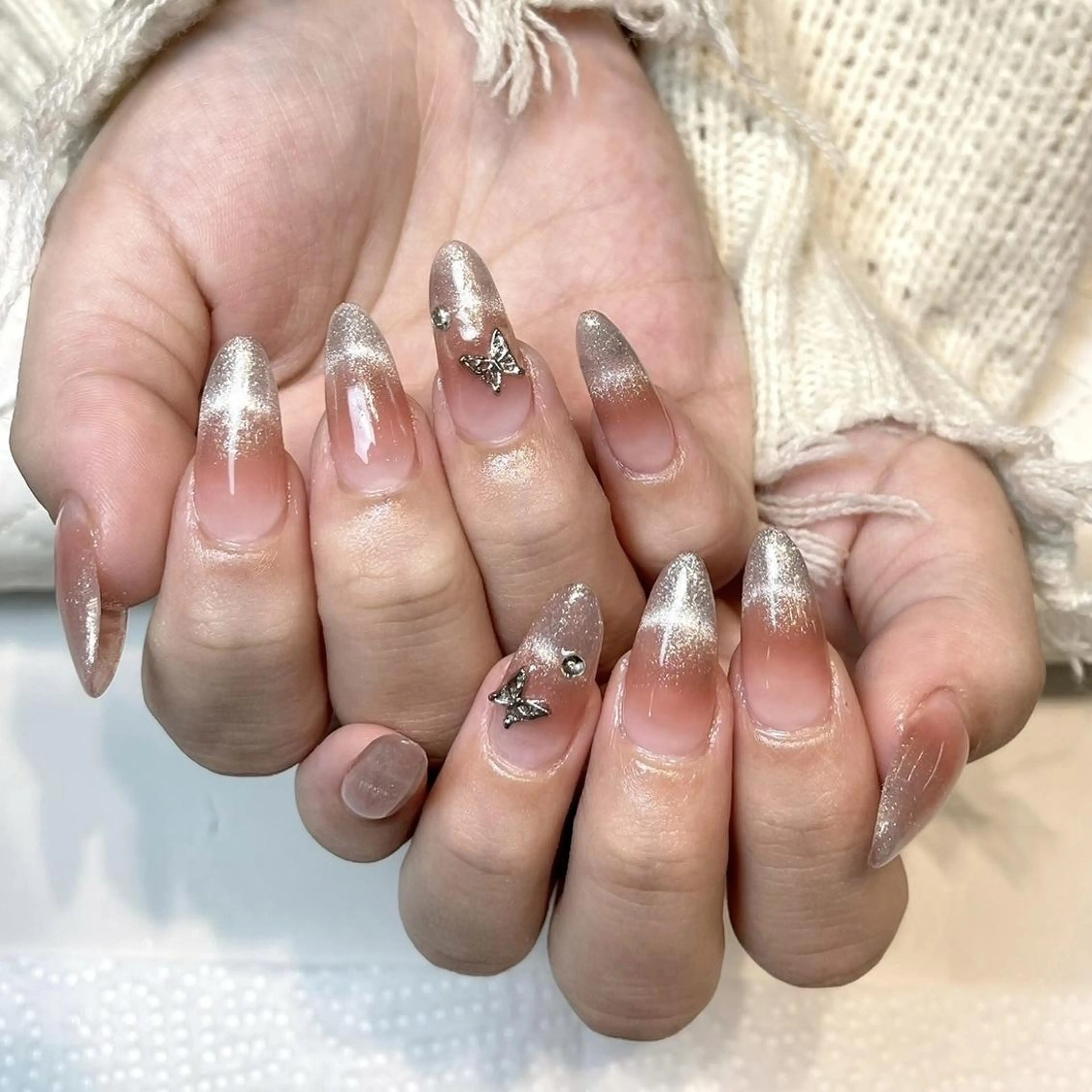 ネイル RAFFINE 月🦋🩵のネイルデザイン