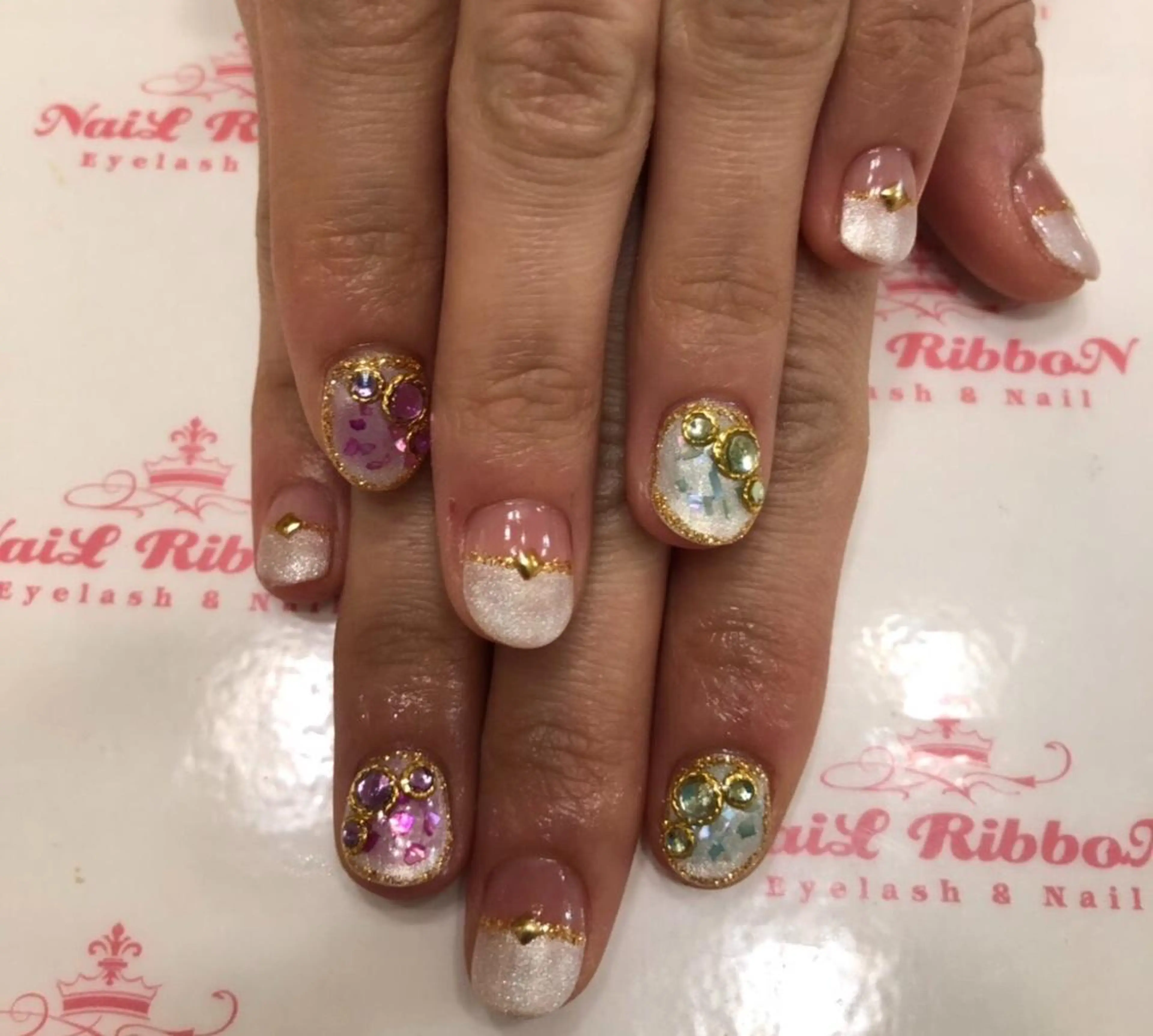 ネイル 春ネイル ネイルリボン 受付スタッフのネイルデザイン