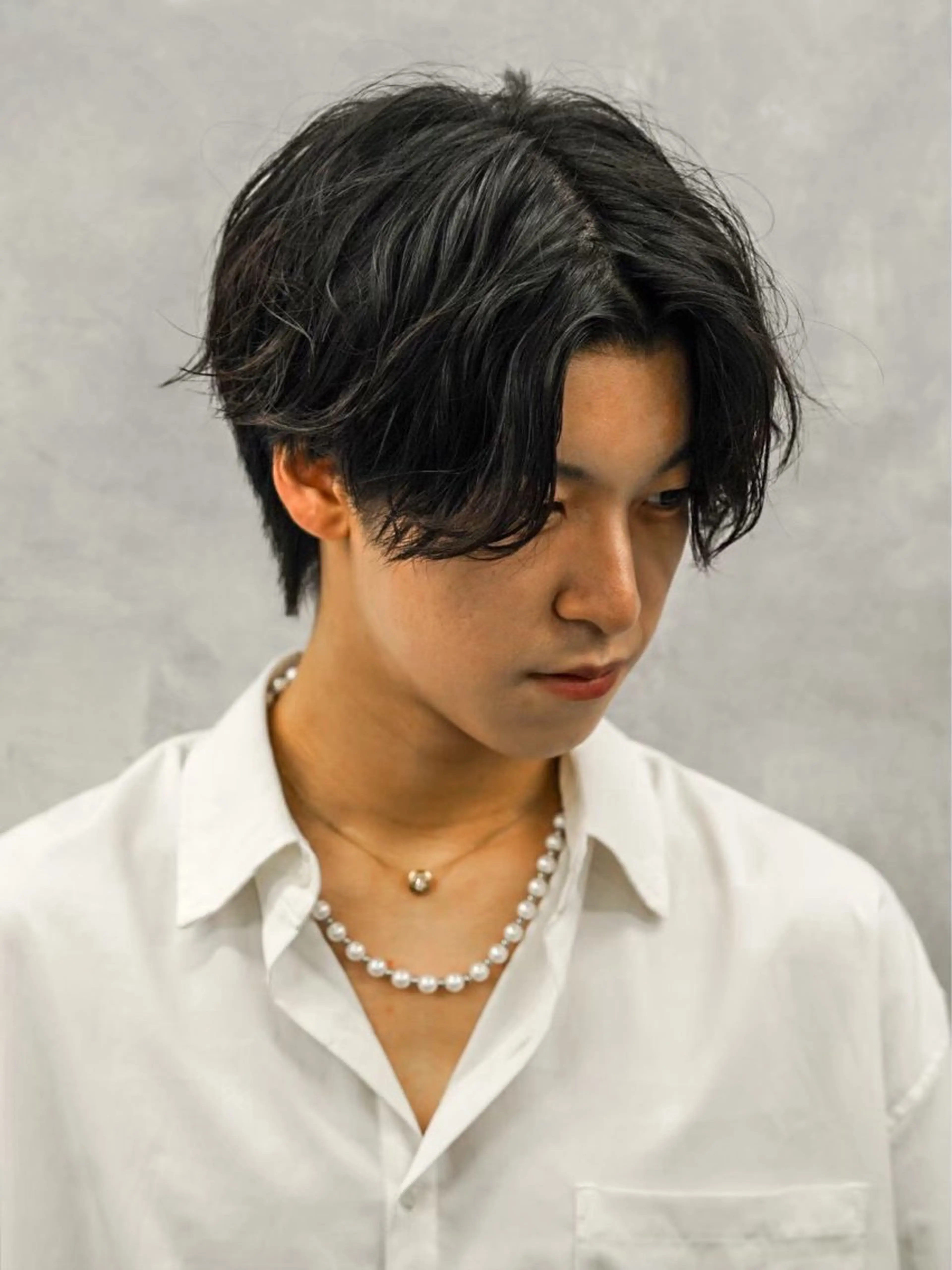 パーマ 経田 偉央のヘアスタイル