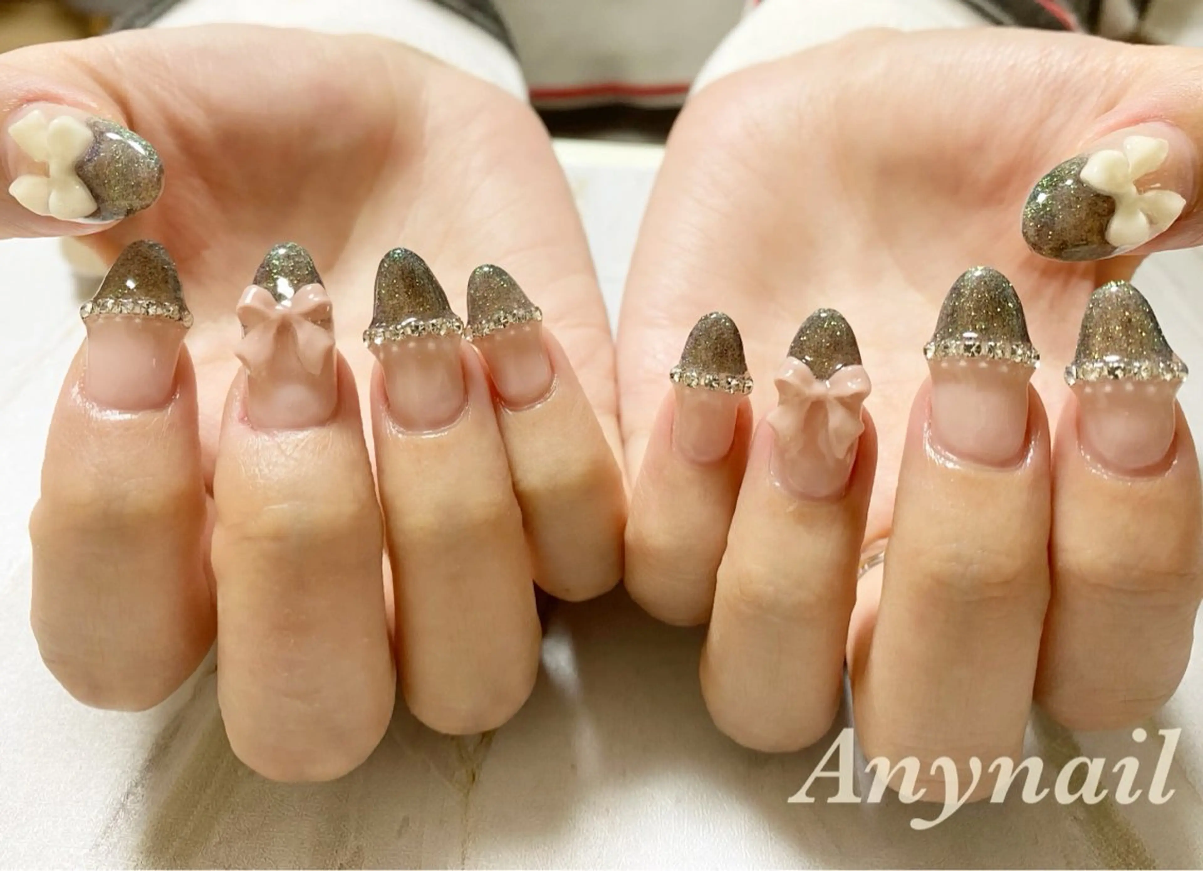 ネイル ブルー フレンチネイル キラキラネイル リボン ストーンネイル 岩澤 恵子のネイルデザイン