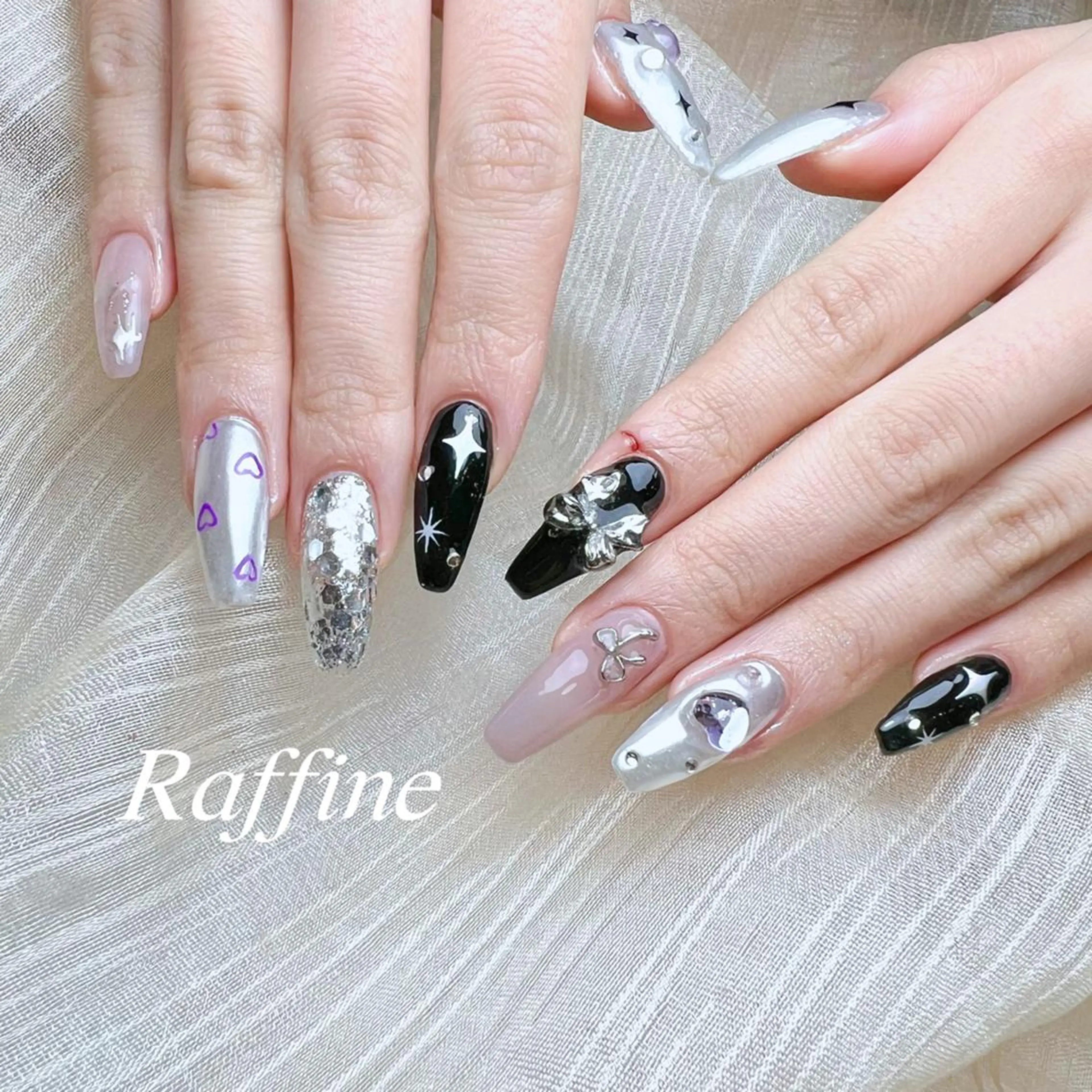 ネイル RAFFINE 月🦋🩵のネイルデザイン