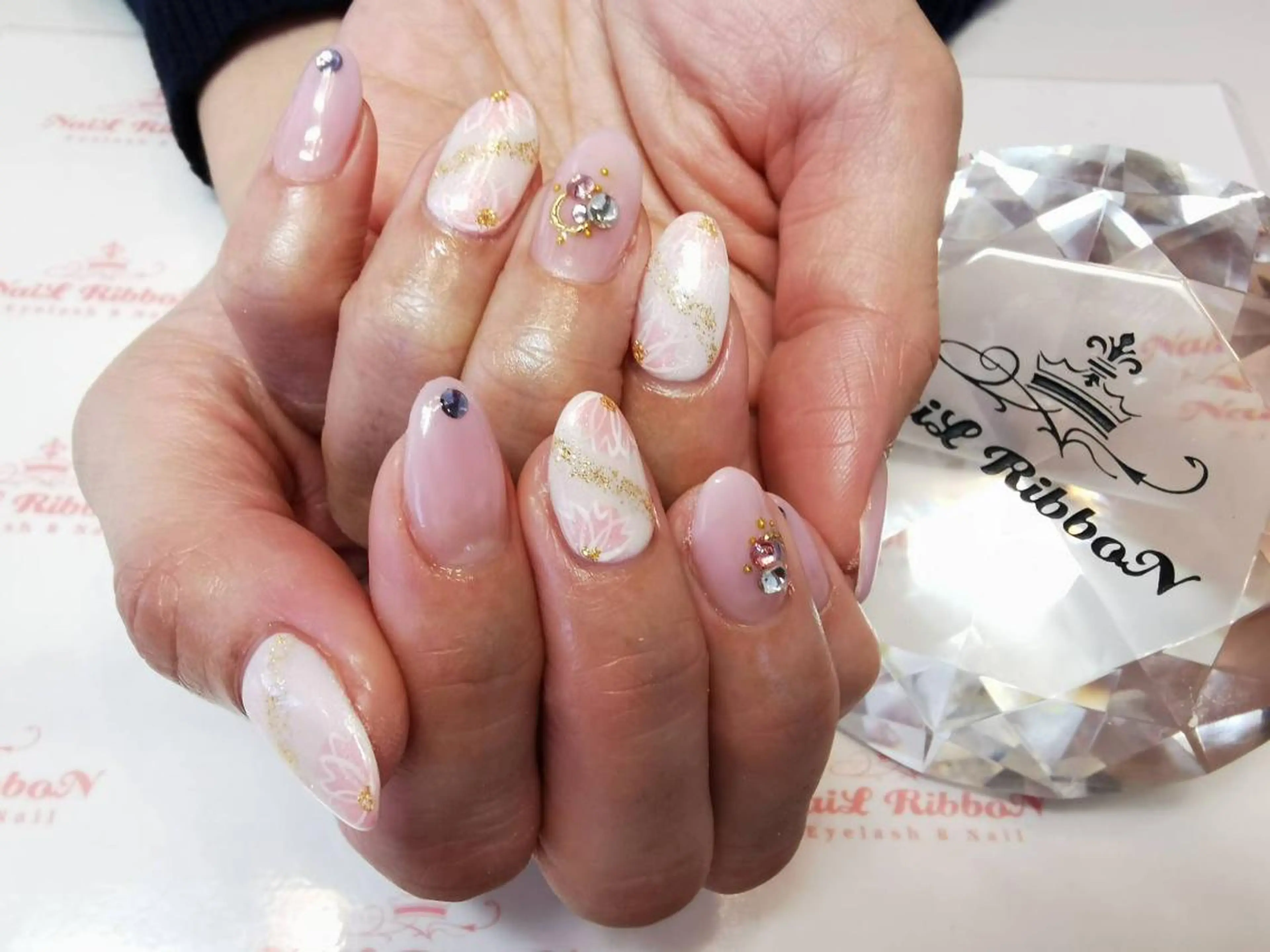 ネイル ネイルリボン 受付スタッフのネイルデザイン