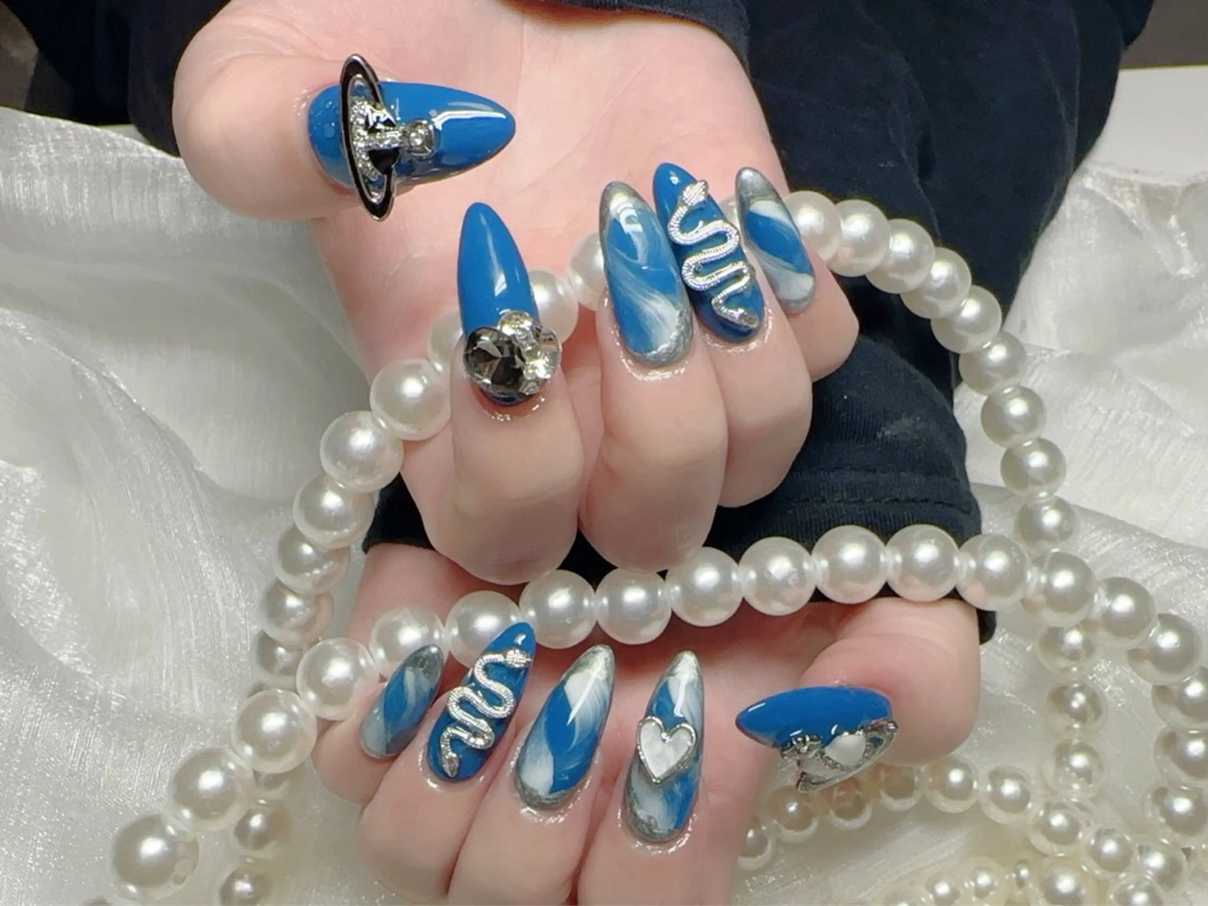 メンズ ネイル 水色 ニュアンスネイル M .のネイルデザイン