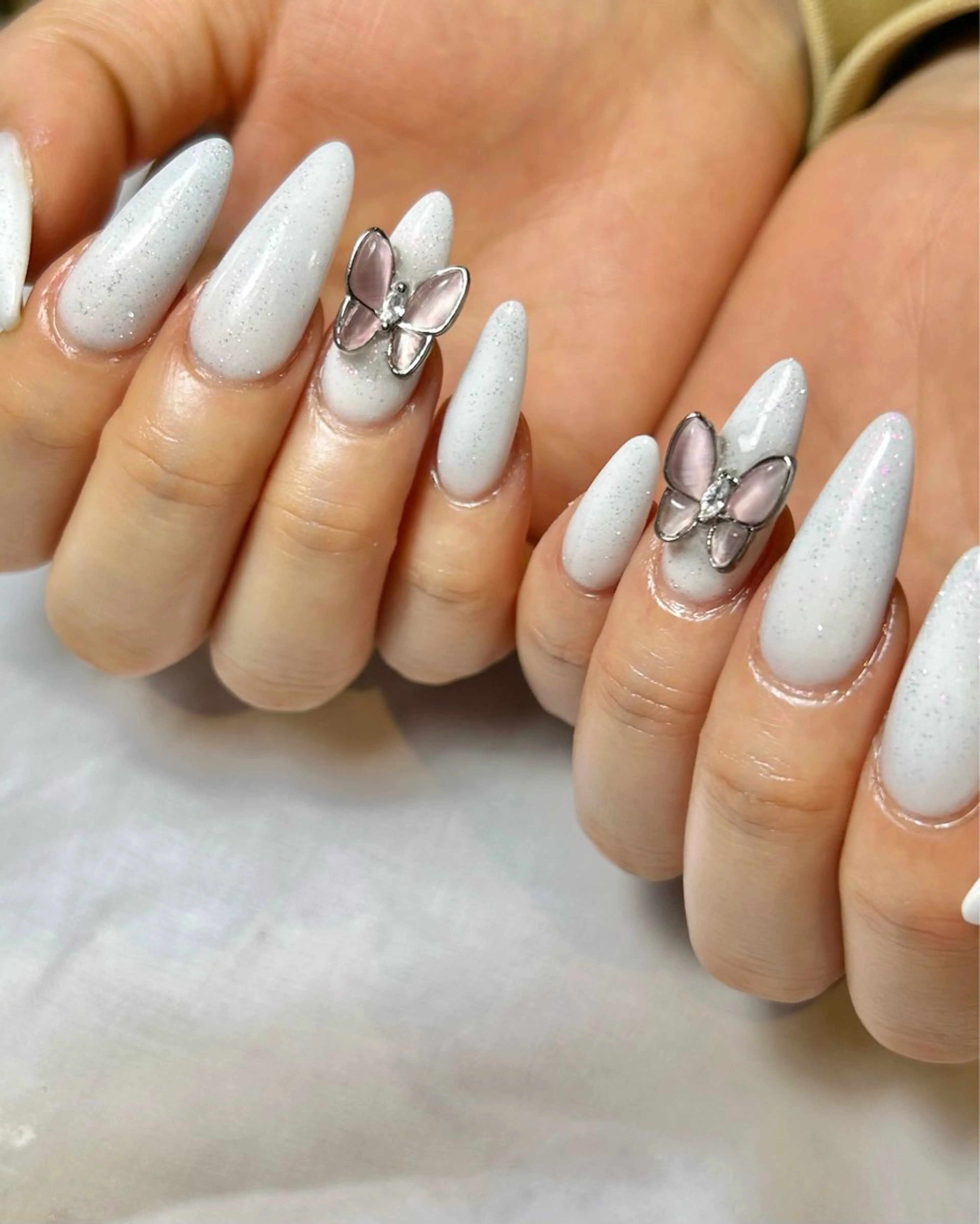 ネイル キラキラネイル ホワイト Reflection marikoのネイルデザイン