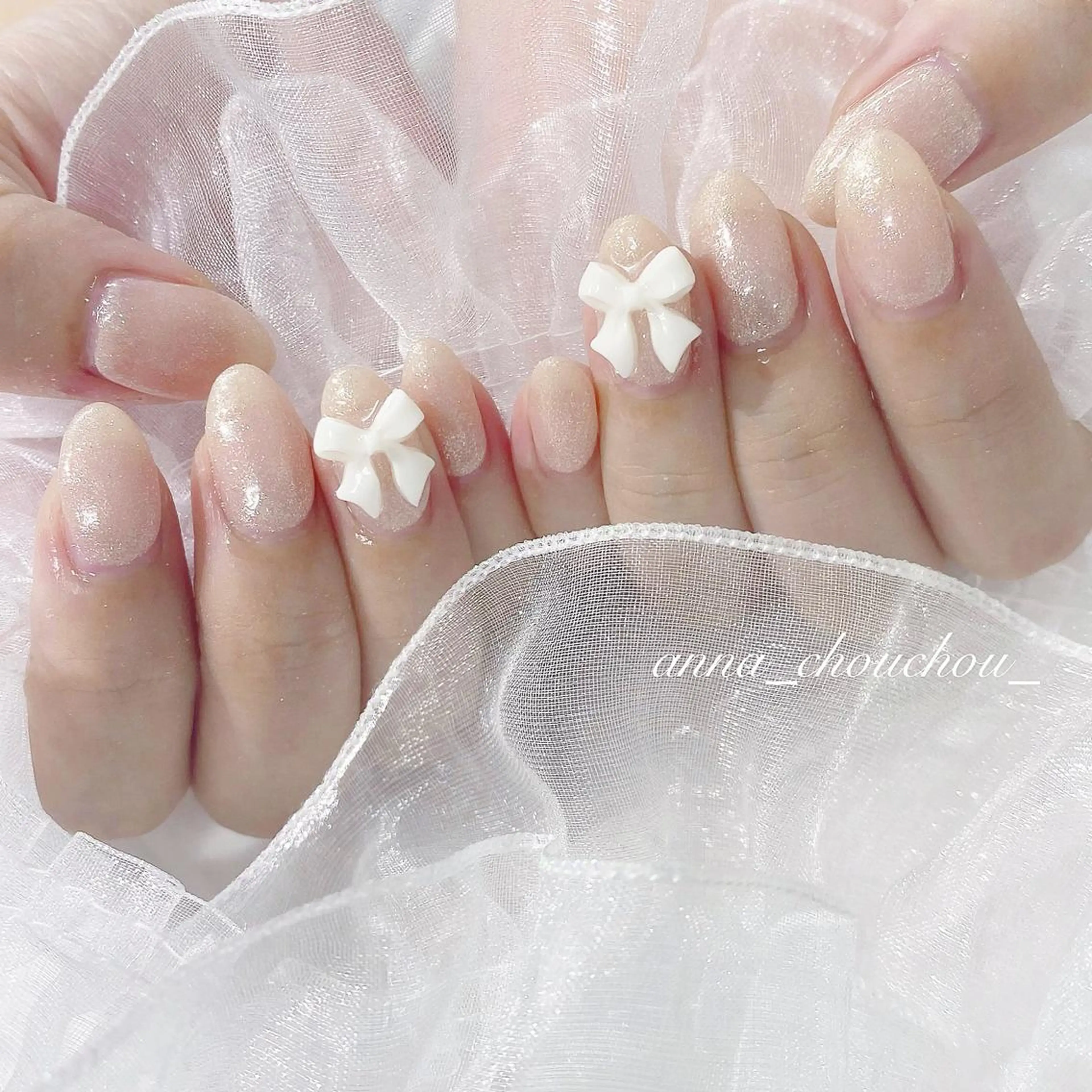 ネイル ガーリー リボン ハンドネイル Anna Sano⭐️のネイルデザイン