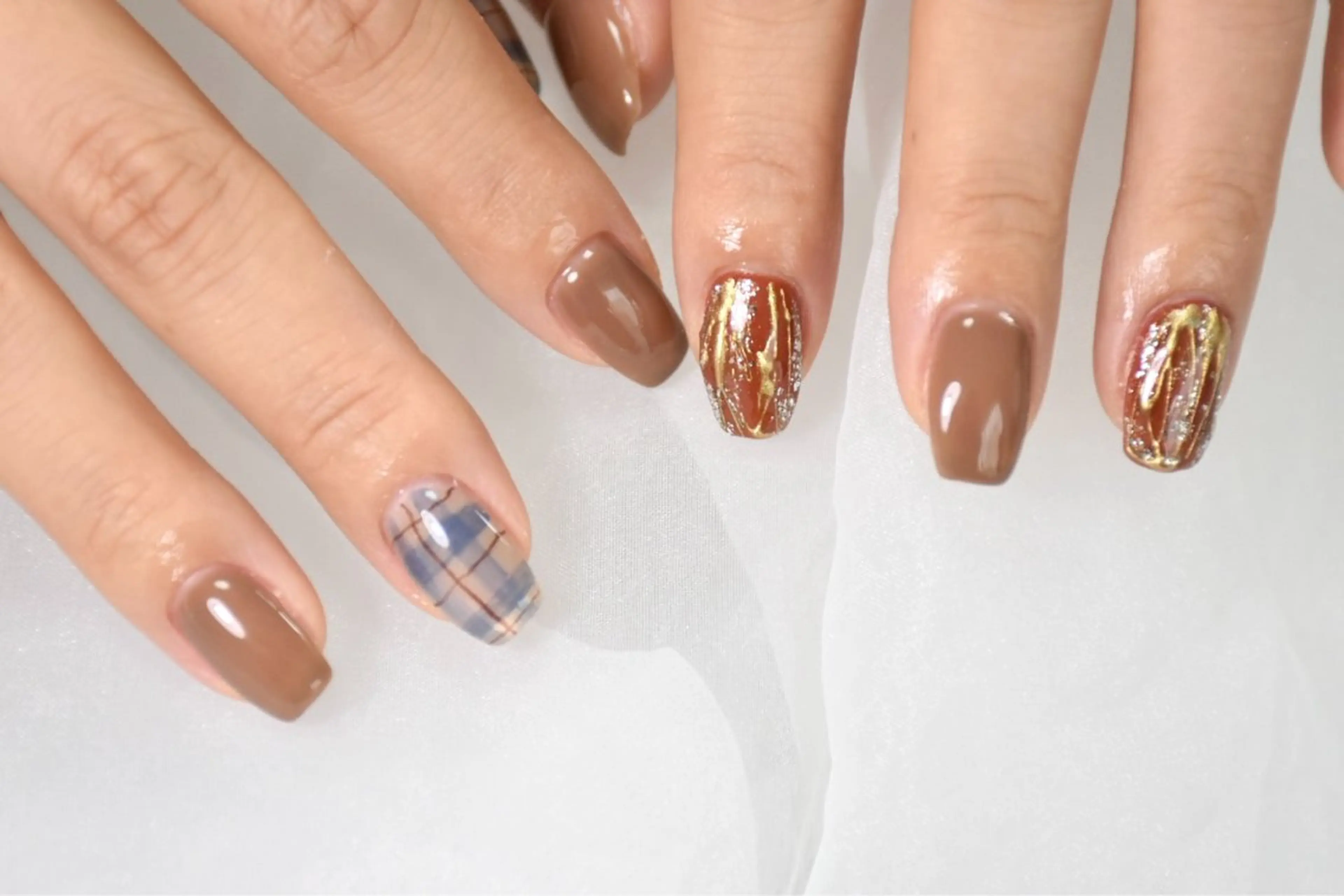 【オフなし】ワンカラー2本アート🤎の写真