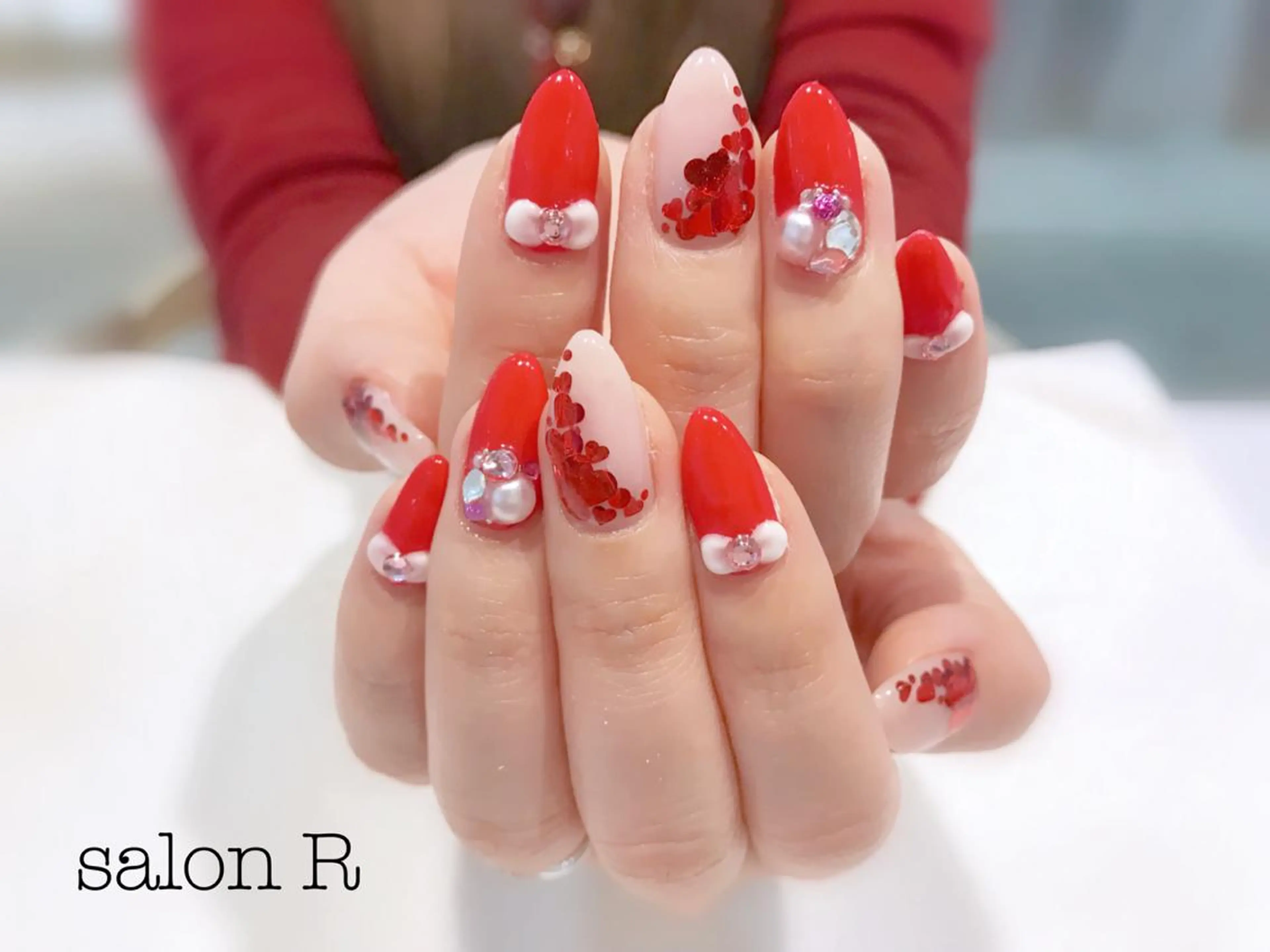 ネイル 赤色 Re Pearl～コーディネートサロン～ 市駅前店所属・NARUMI HYODOのネイルデザイン