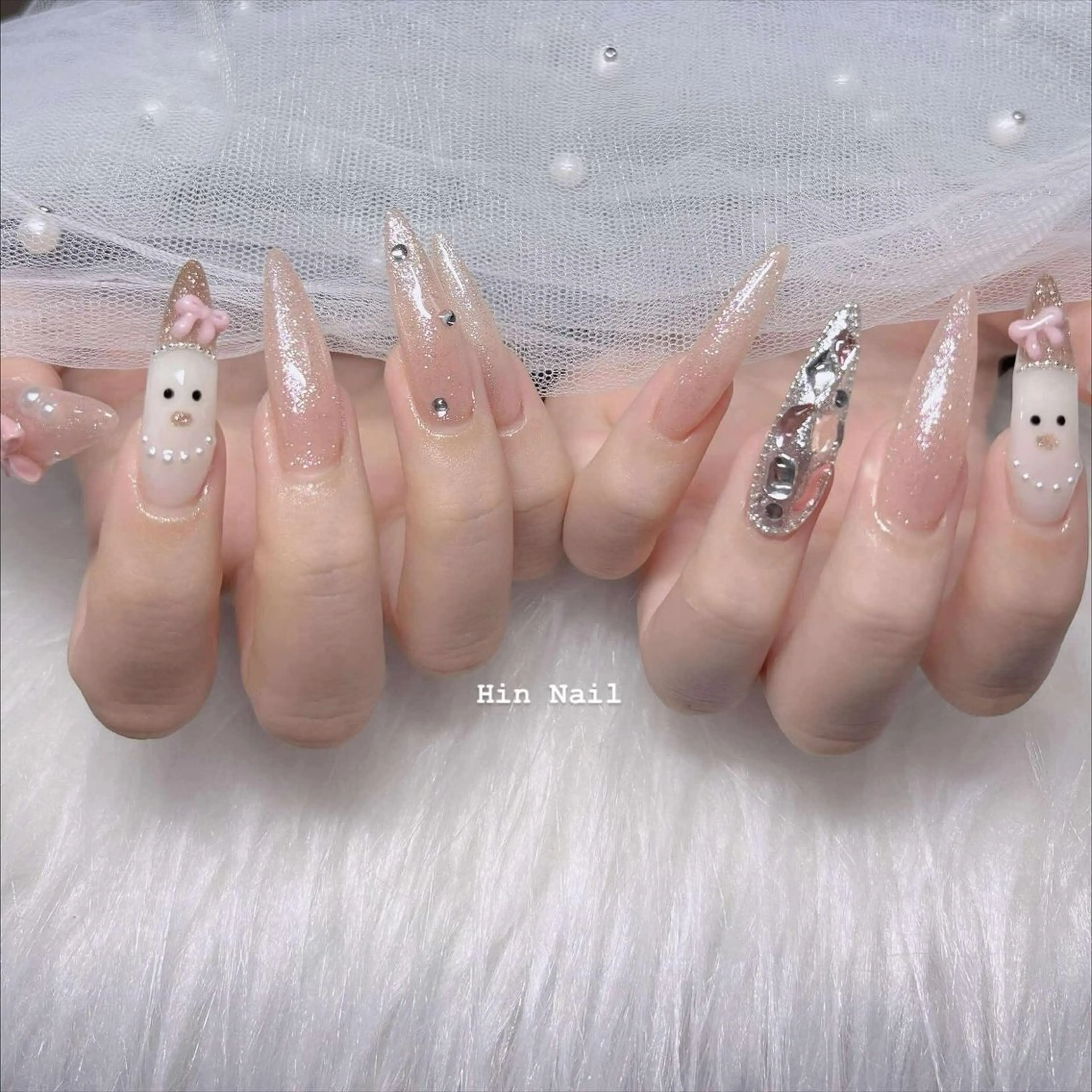 ネイル アニマル柄 ボルドー ブラウン チークネイル フレンチネイル ハンドネイル HIN NAILのネイルデザイン