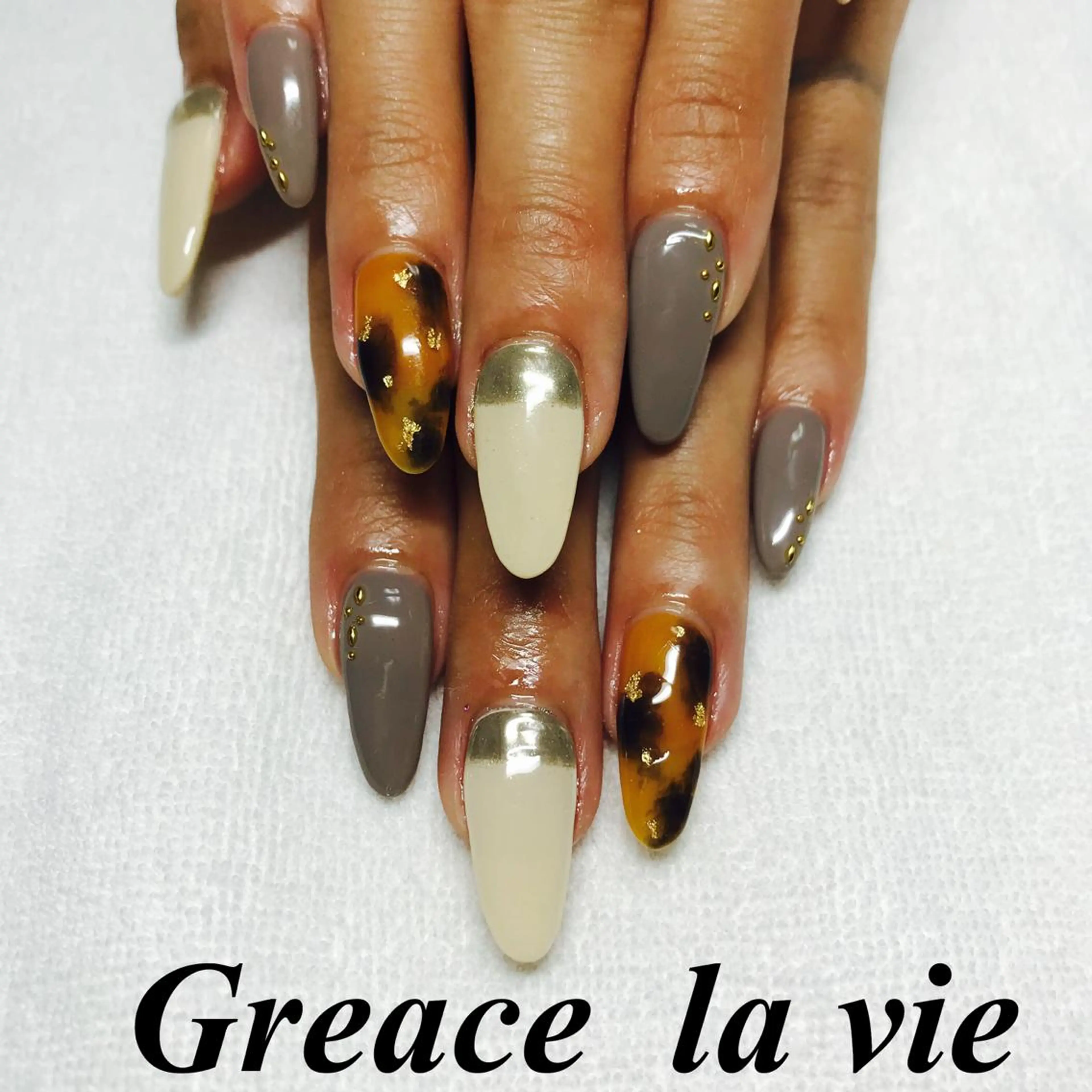 ロング カラー パーマ ヘアアレンジ キッズ ネイル マツエク・マツパ べっ甲ネイル カジュアル Greace la vie所属・Greace  la vieのネイルデザイン