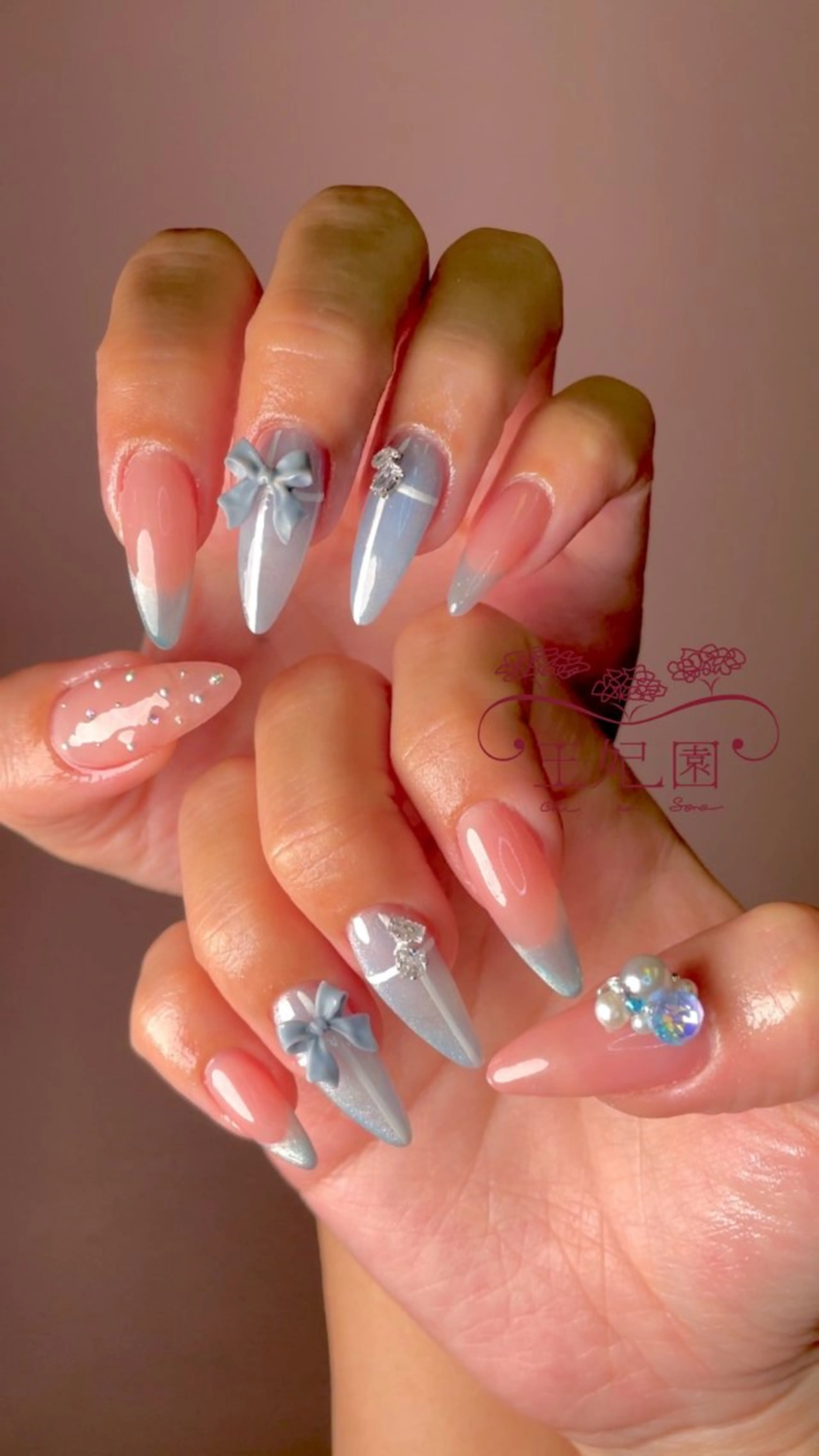 ネイル ブルー フレンチネイル ガラスフレンチ 水色 リボン nail salon王妃の園所属・王妃の園 ohinosonoのネイルデザイン