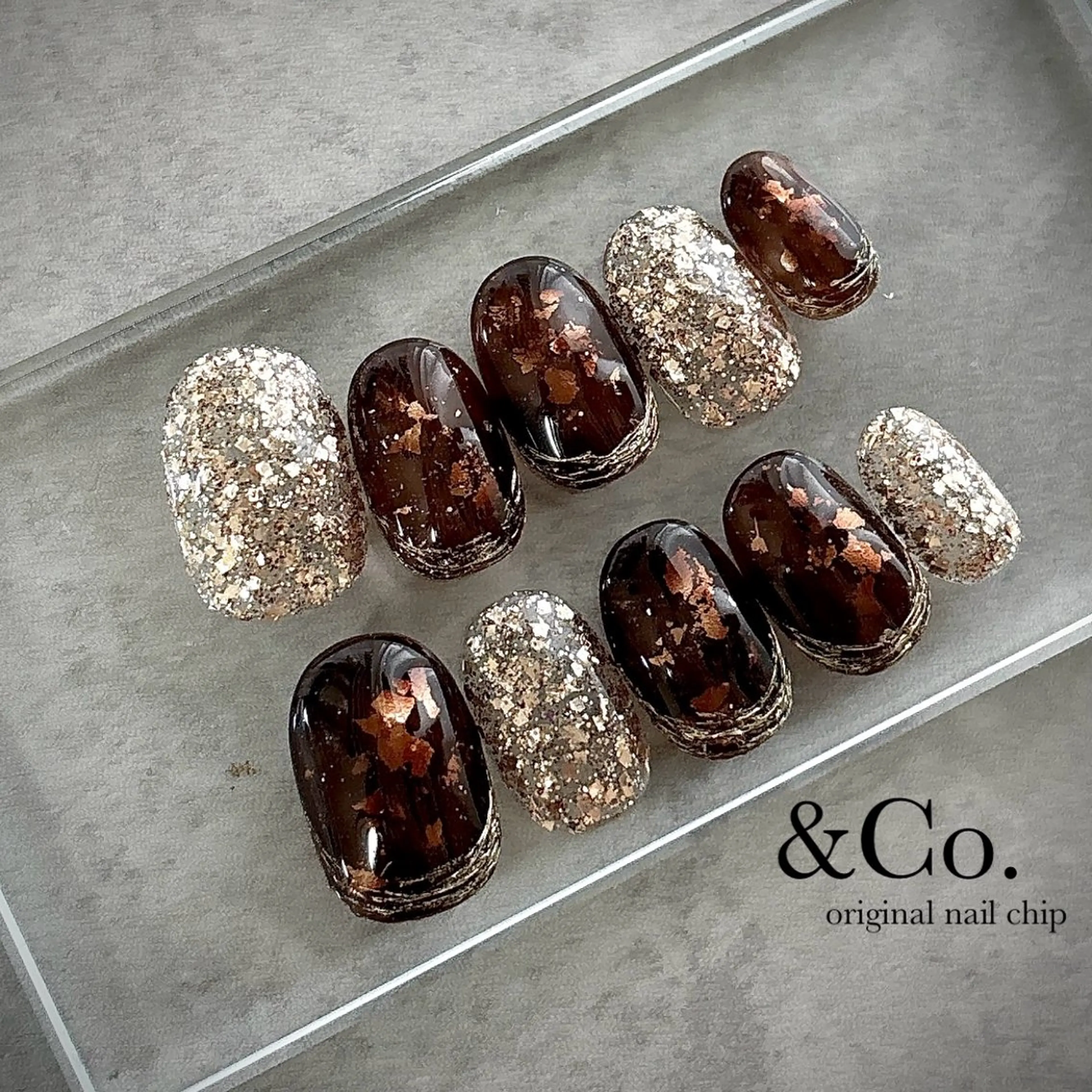 ネイル べっ甲ネイル キラキラネイル ハンドネイル ハンドケア Lilly Co.のネイルデザイン