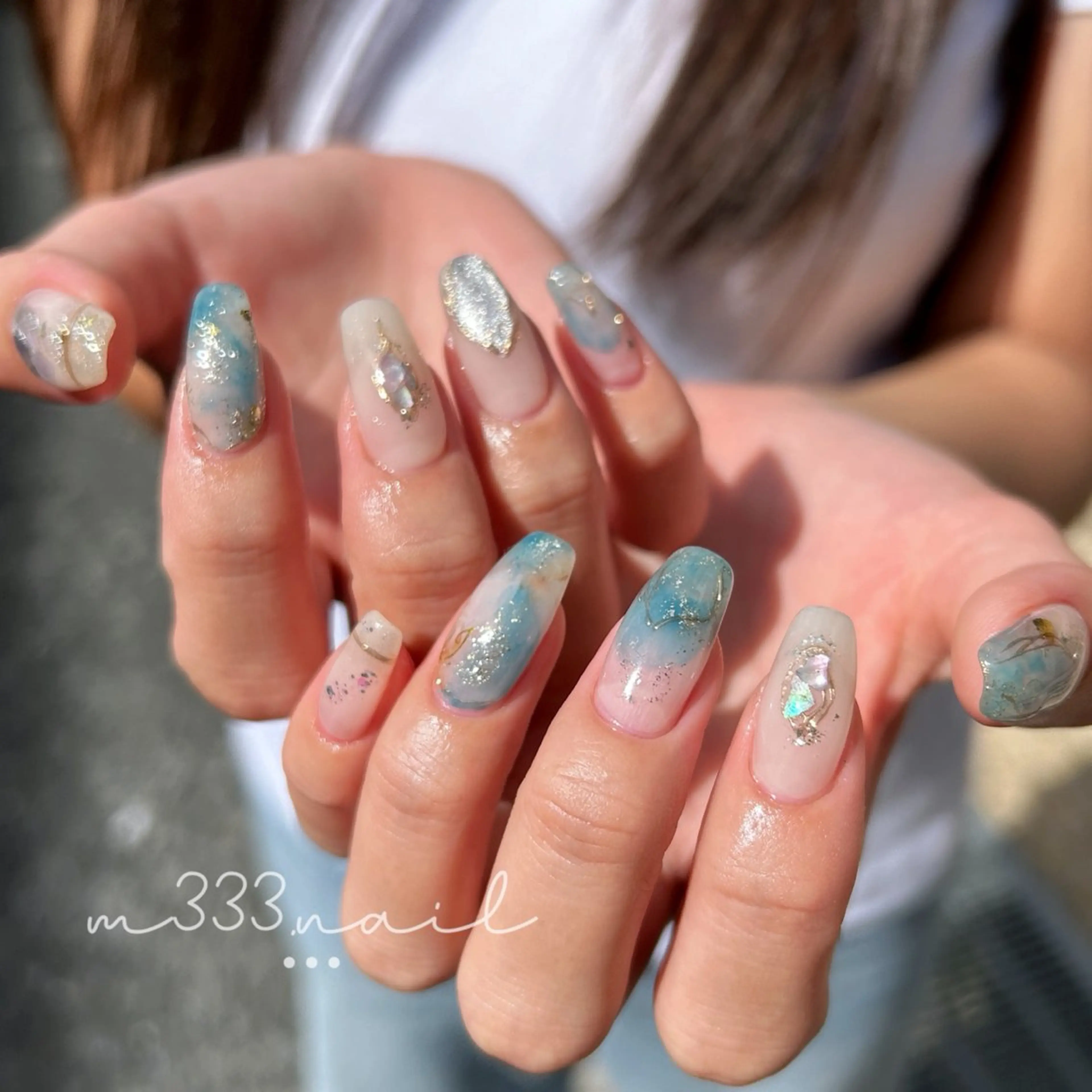 ネイル ブルー 水色 ロングネイル ニュアンスネイル 夏ネイル ハンドネイル hair  MILE.所属・MILE. mukonosouのネイルデザイン