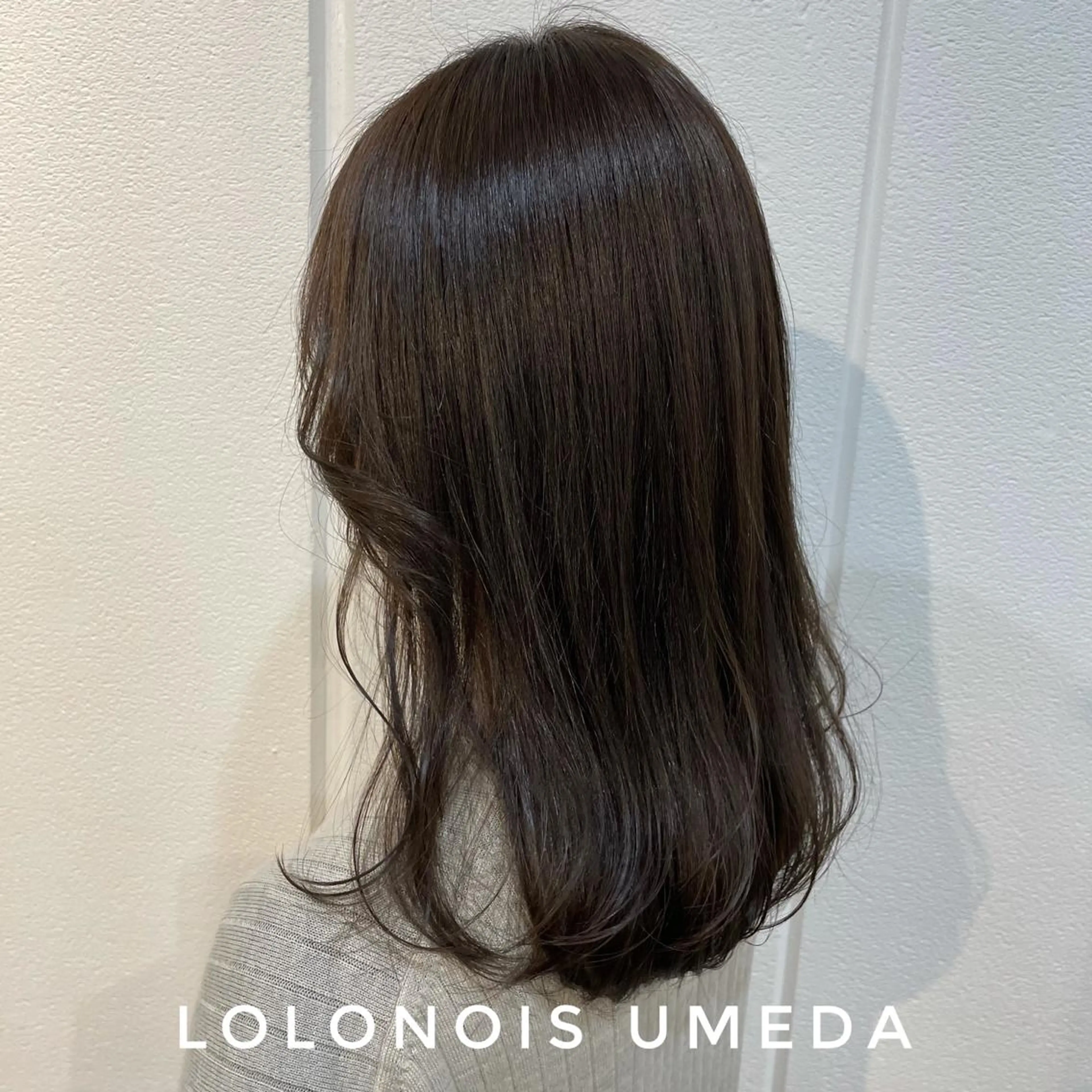 ロング チョコレートブラウン Lolonois梅田 /Okazaki:)のヘアスタイル