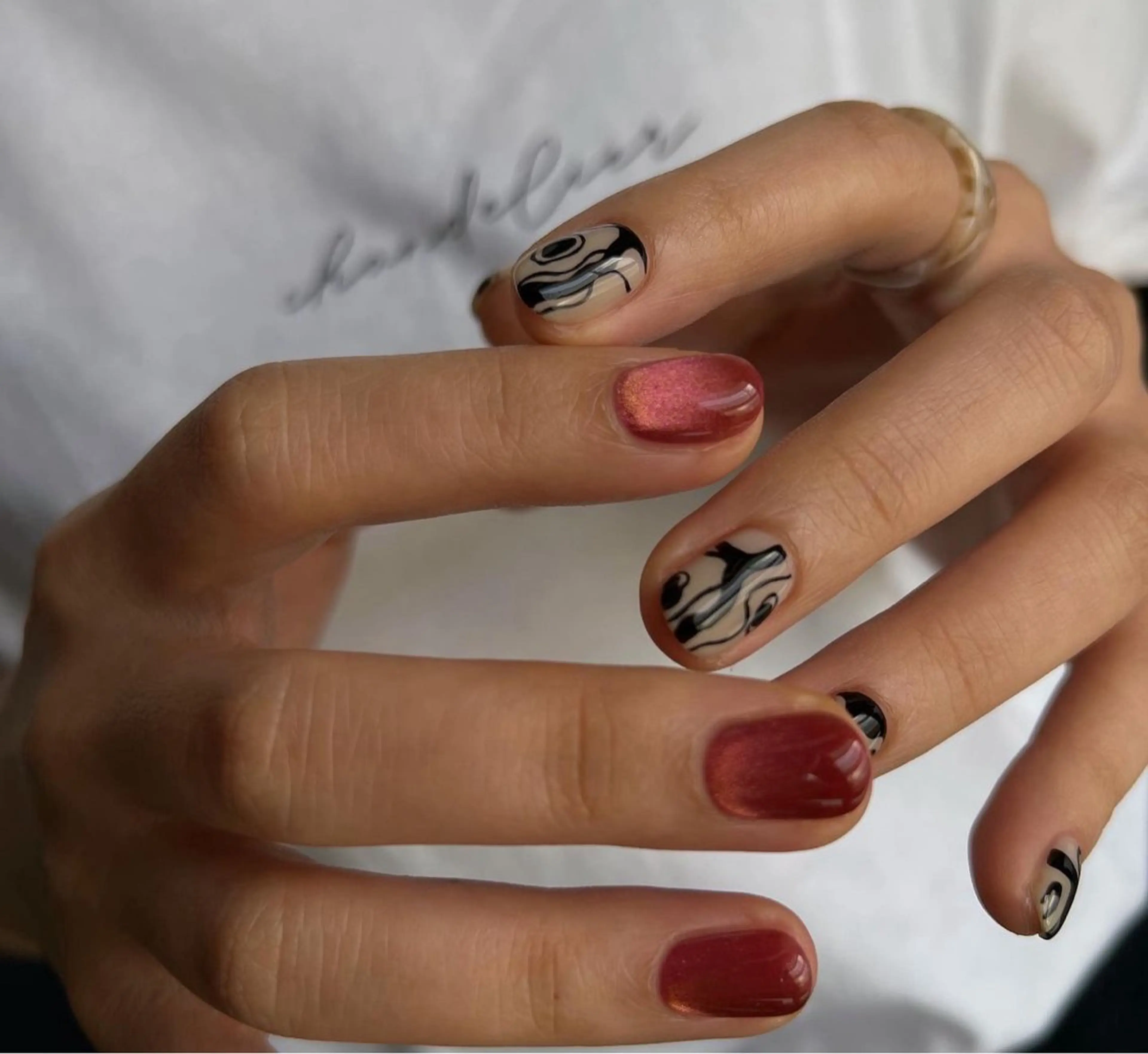 ネイル チークネイル 韓国ネイル マグネットネイル ニュアンスネイル リボン ちりんネイル所属・chirin nailのネイルデザイン