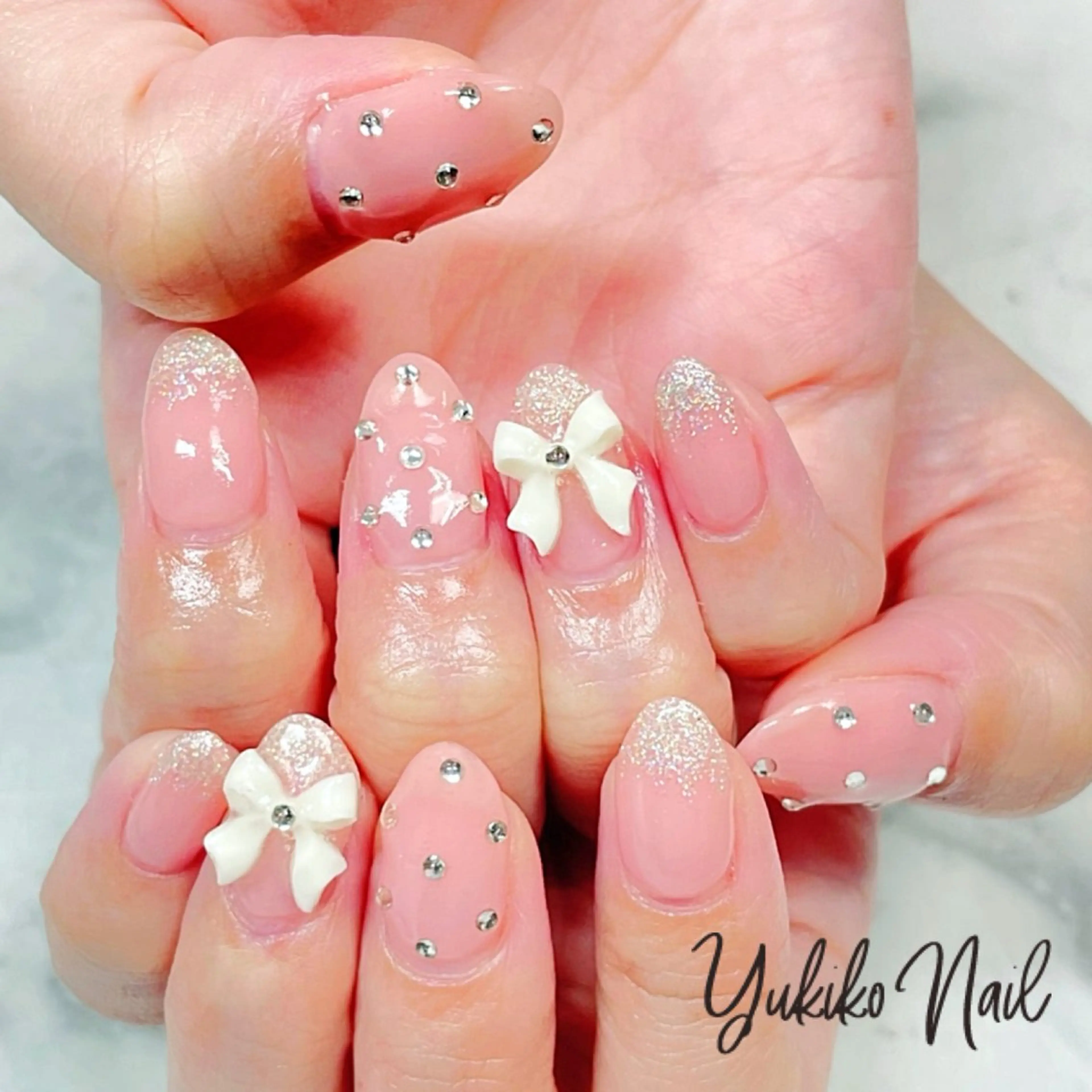 ネイル キラキラネイル 韓国ネイル ピンク リボン ワンホンネイル ハンドネイル ユキコ ネイルのネイルデザイン