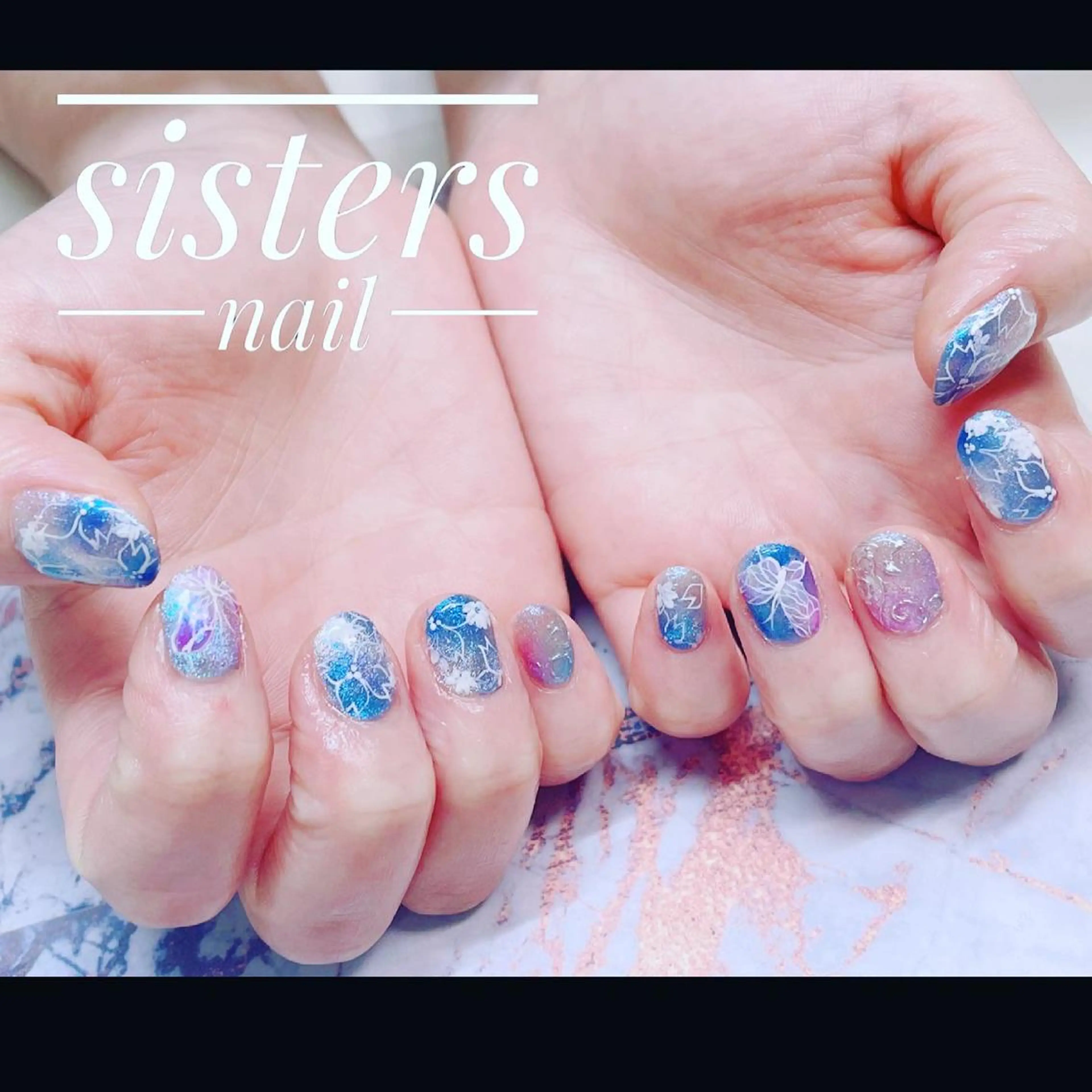 ネイル アートネイル ブルー 桜ネイル フラワーネイル ジェルネイル ハンドネイル ハンドケア sisters nail.fのネイルデザイン