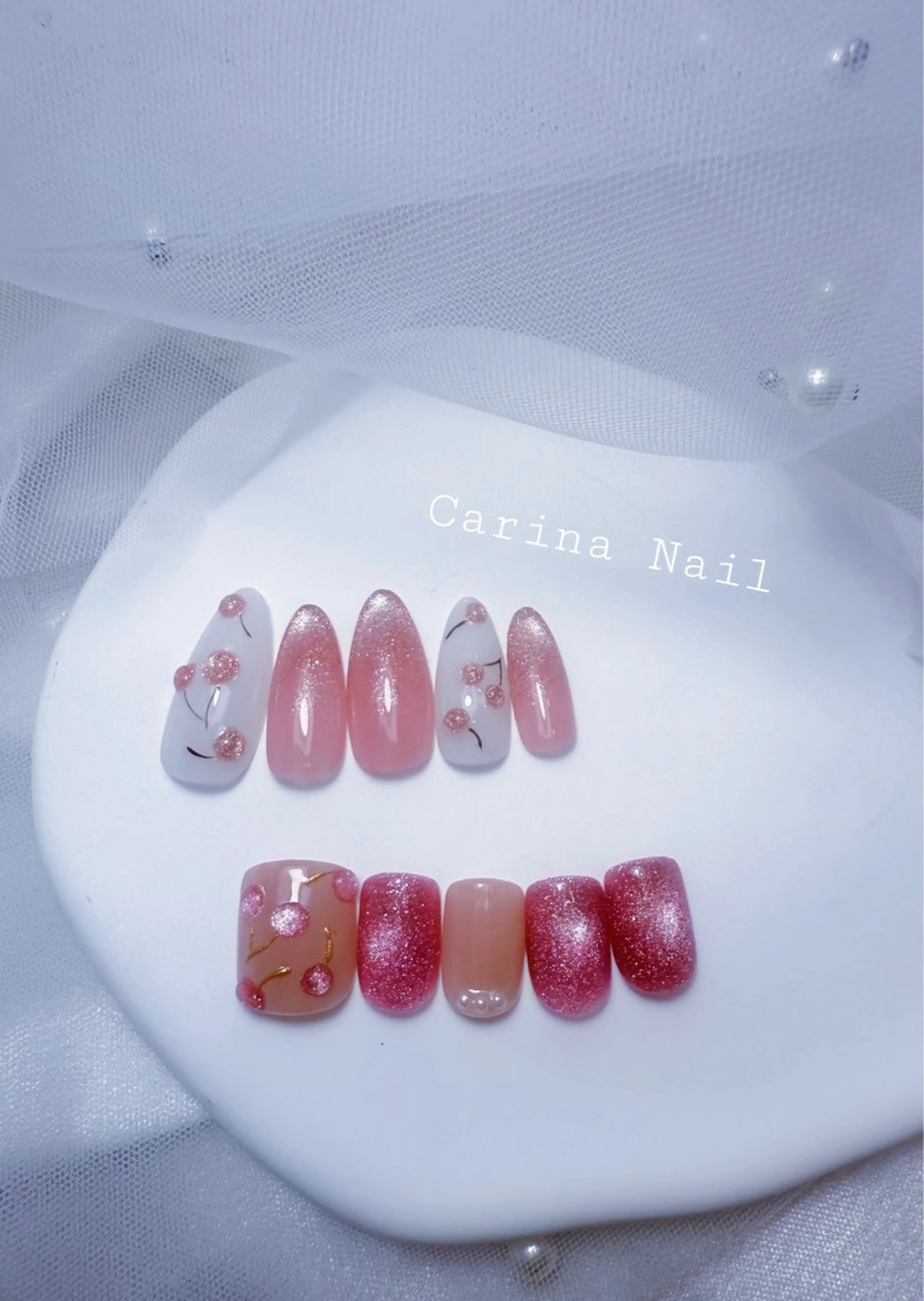 ネイル アートネイル フットネイル キラキラネイル ピンク 春ネイル Carina Nail所属・Carina Nailのネイルデザイン