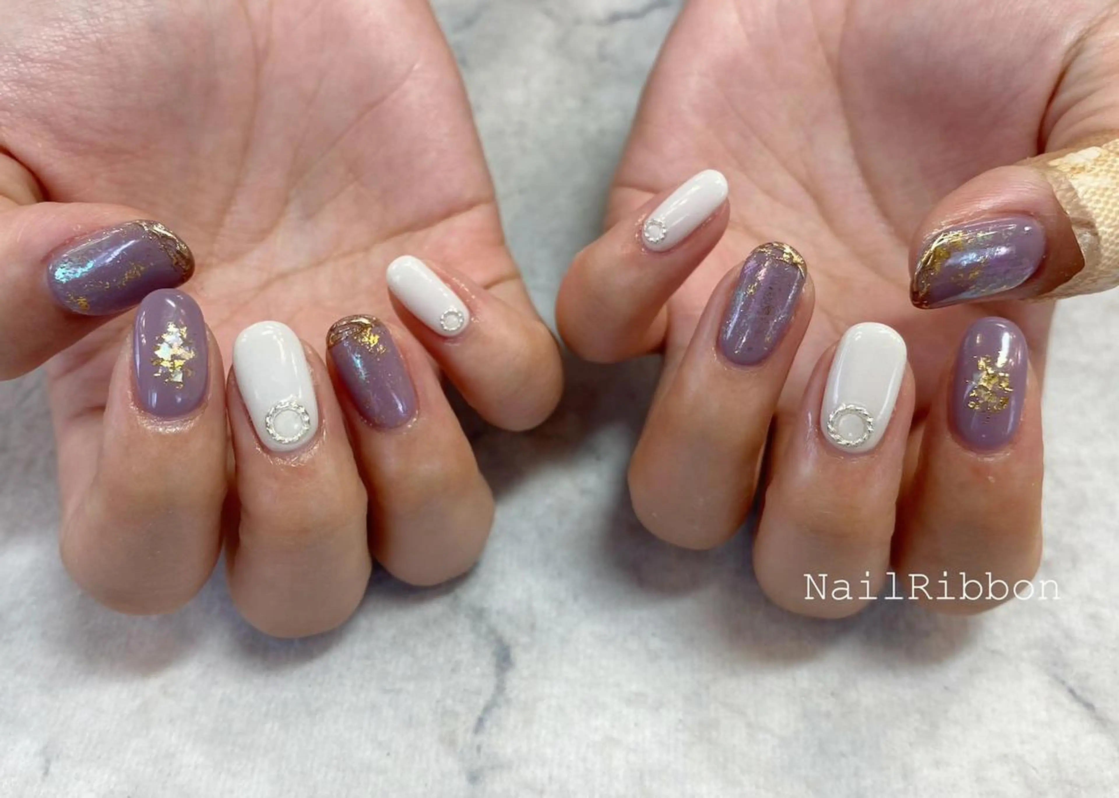 ネイル ネイルリボン 受付スタッフのネイルデザイン