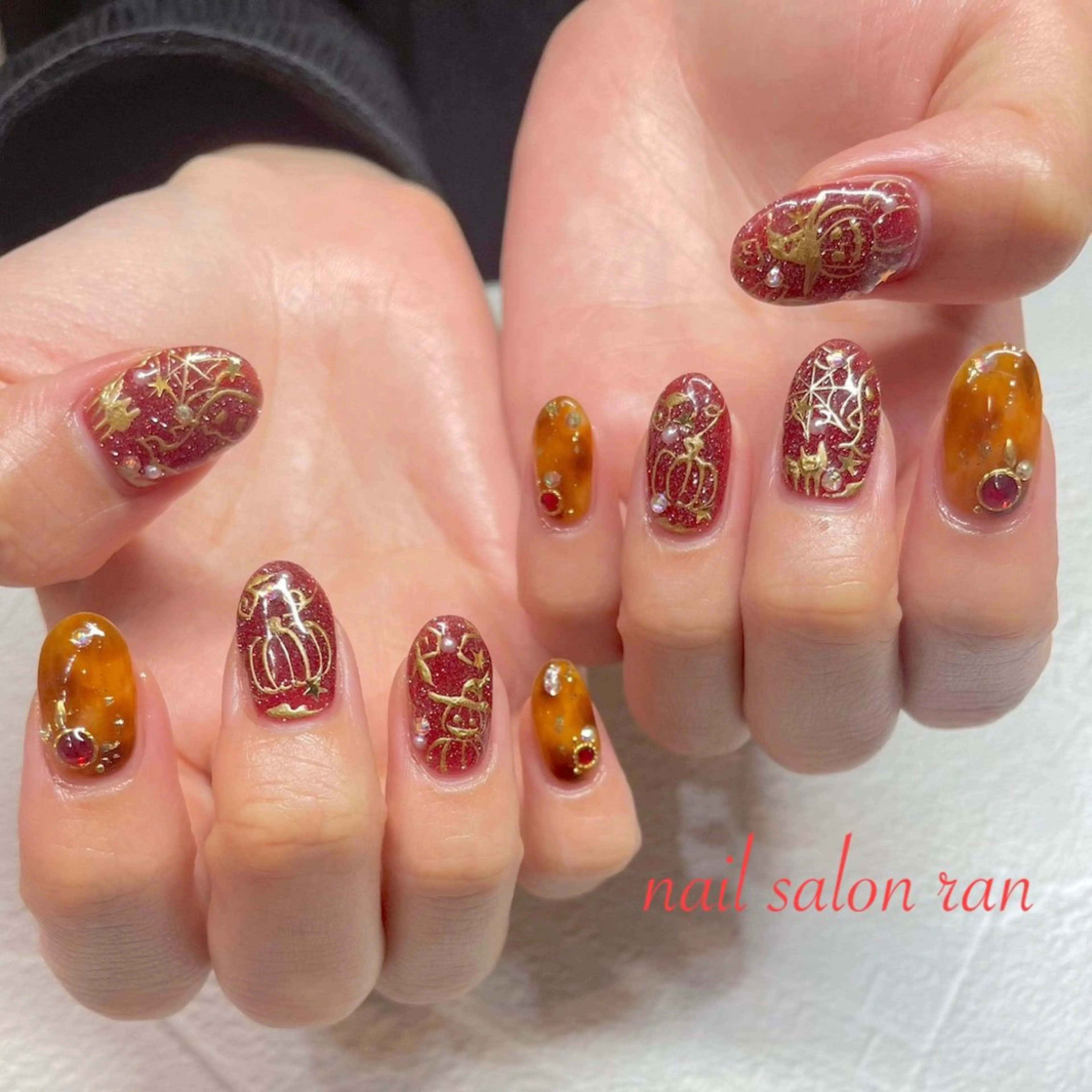 ネイル べっ甲ネイル ゴールド ハロウィン ラメ(グリッター) 赤色 ハンドネイル ハンドケア nailsalon ranのネイルデザイン