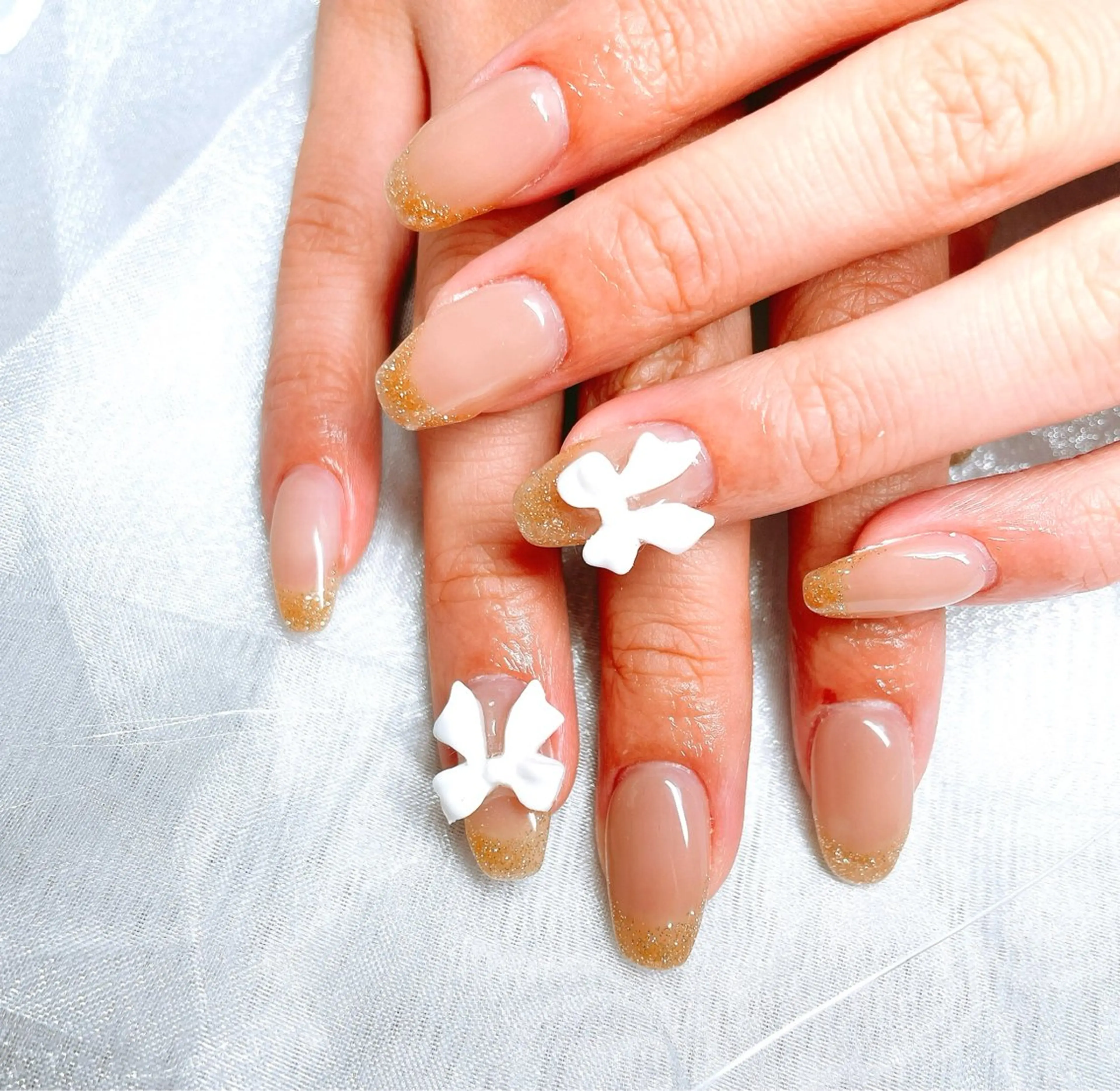 ネイル フレンチネイル キラキラネイル リボン シンプルネイル ハンドネイル ハンドケア GAL_ NAILのネイルデザイン