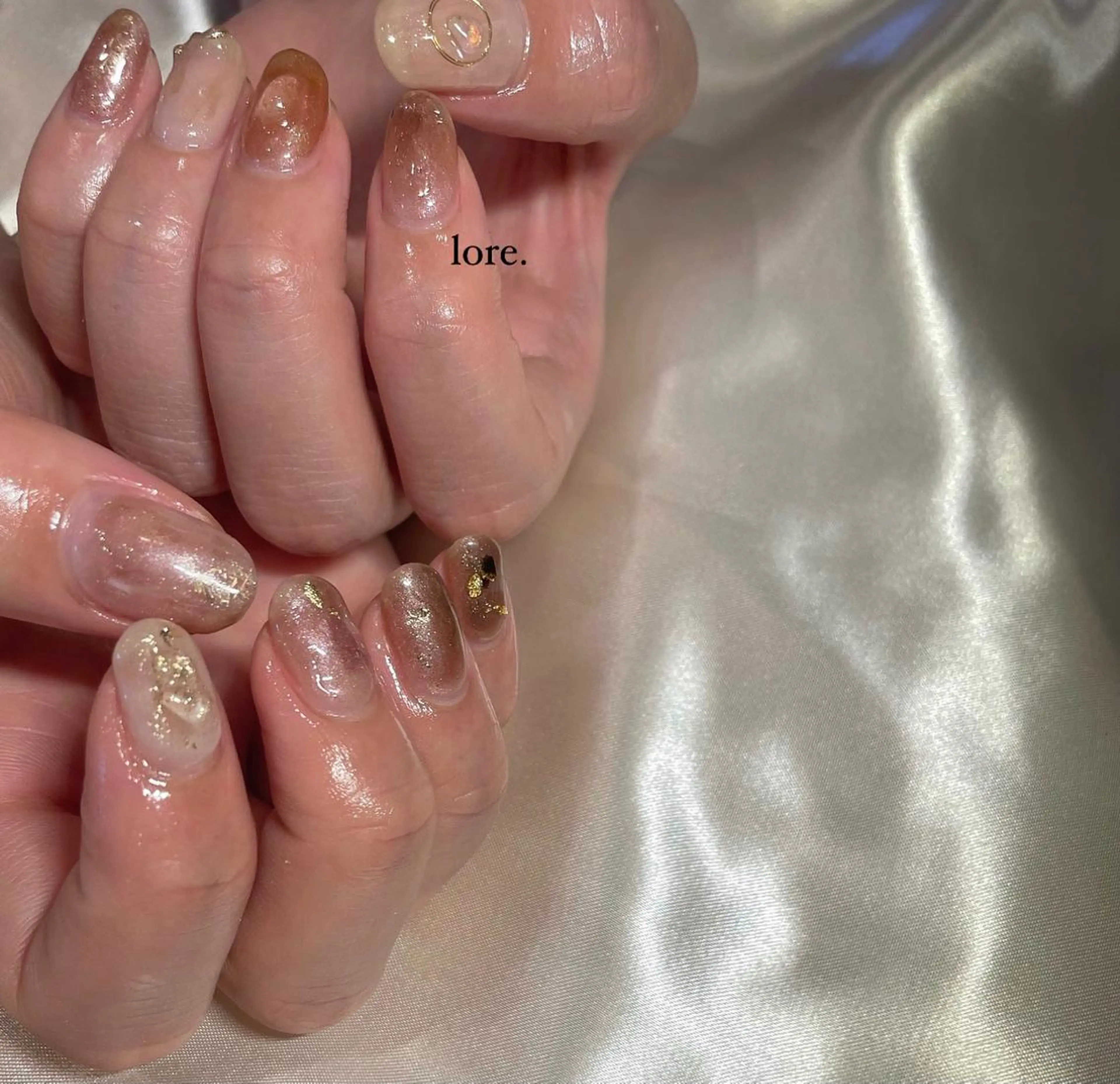 ネイル ブラウン ニュアンスネイル lore. nailのネイルデザイン