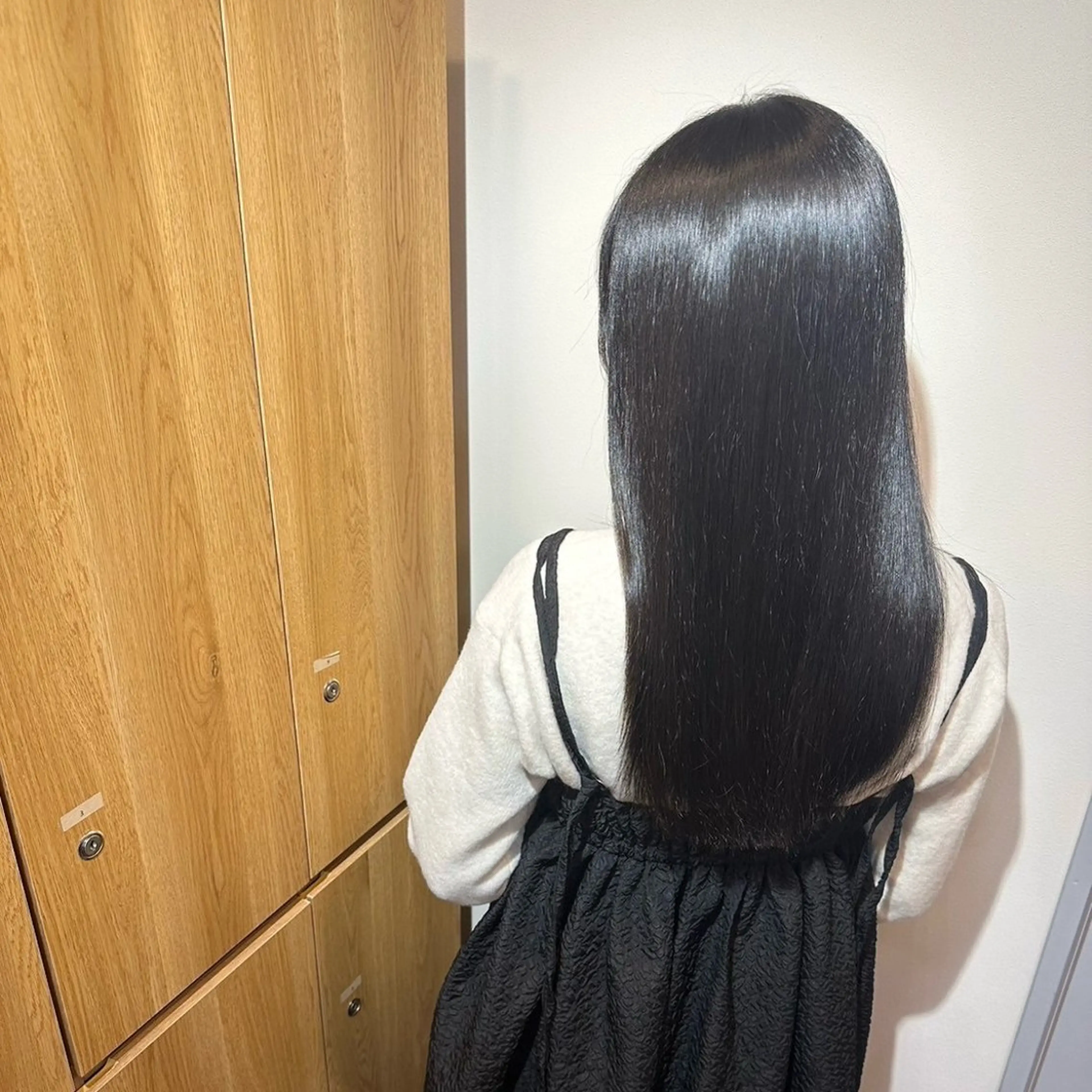 ロング 岡田 佳子のヘアスタイル