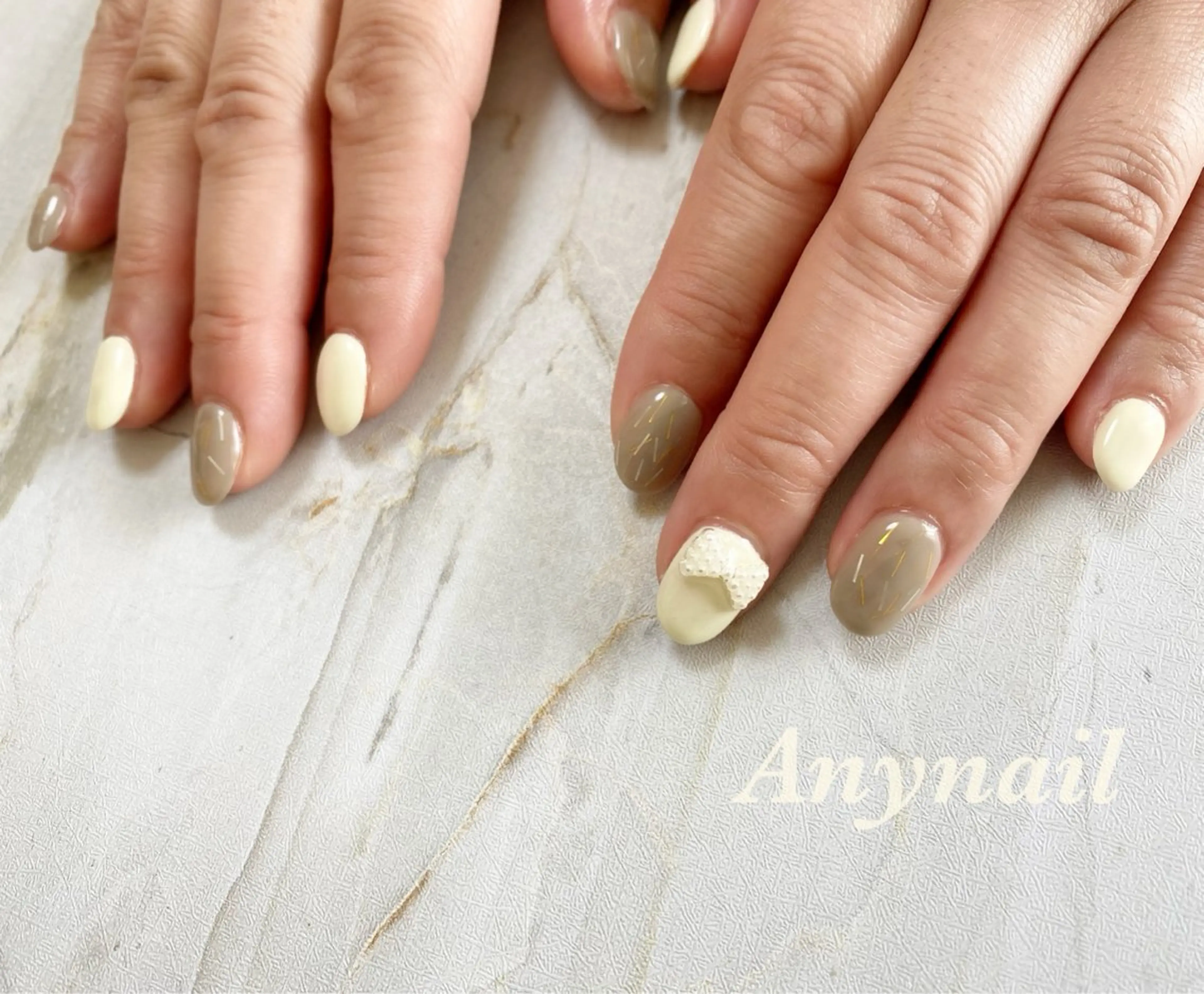 ネイル ブルー オフィスネイル ワンカラーネイル リボン ショートネイル 岩澤 恵子のネイルデザイン