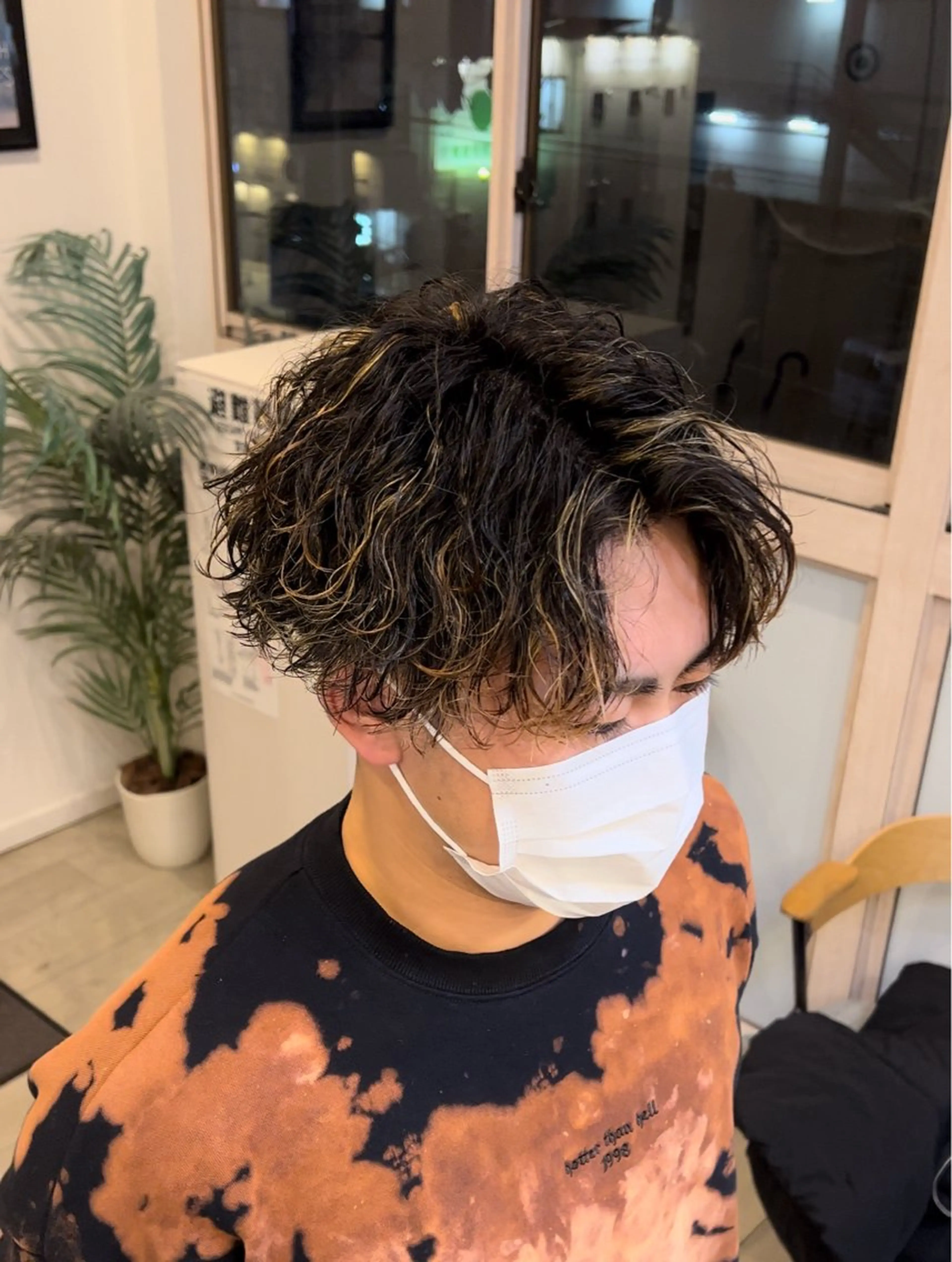 カット＋波巻きスパイラルパーマの写真