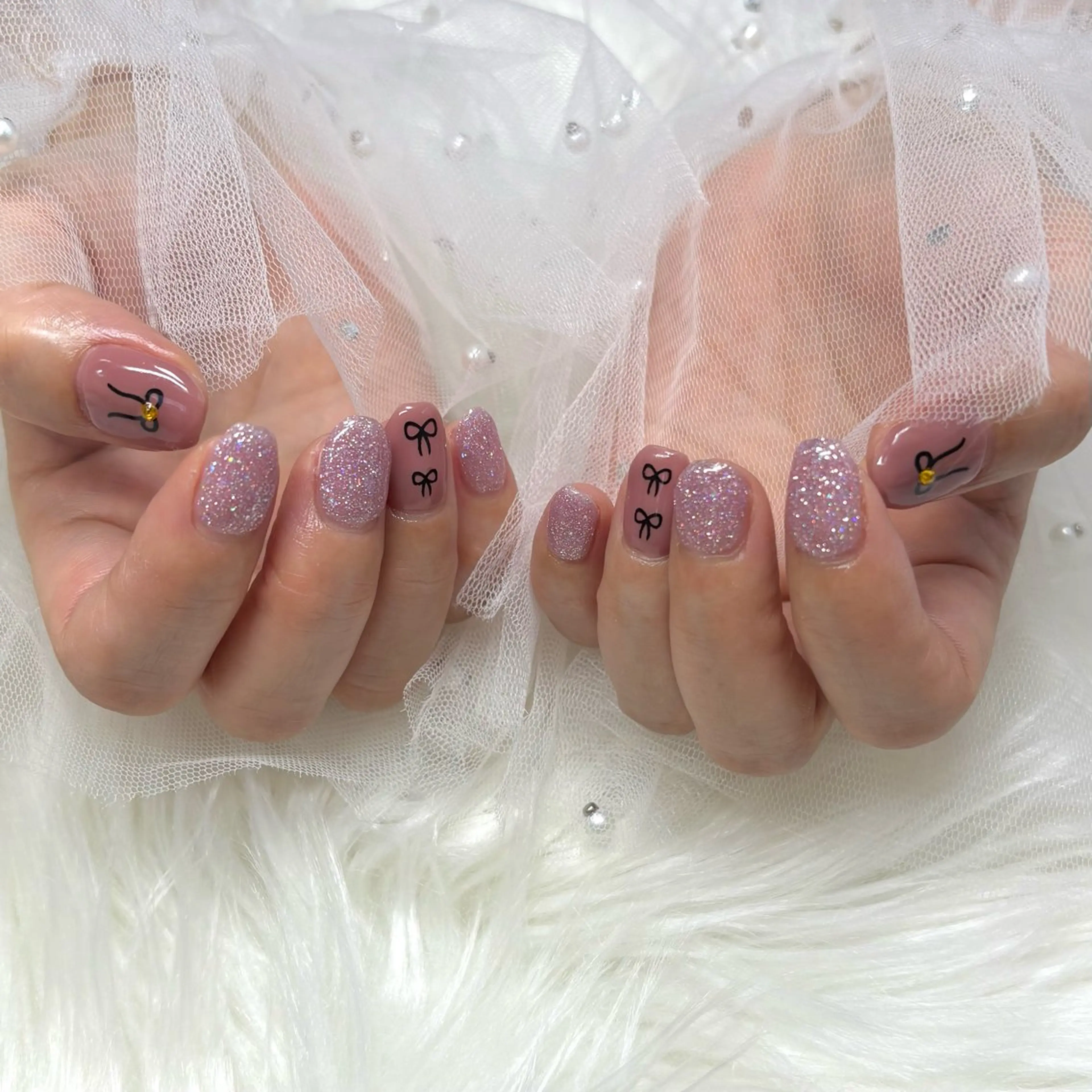 ネイル ピンク リボン ストーンネイル ハンドネイル SHINE nail salonのネイルデザイン