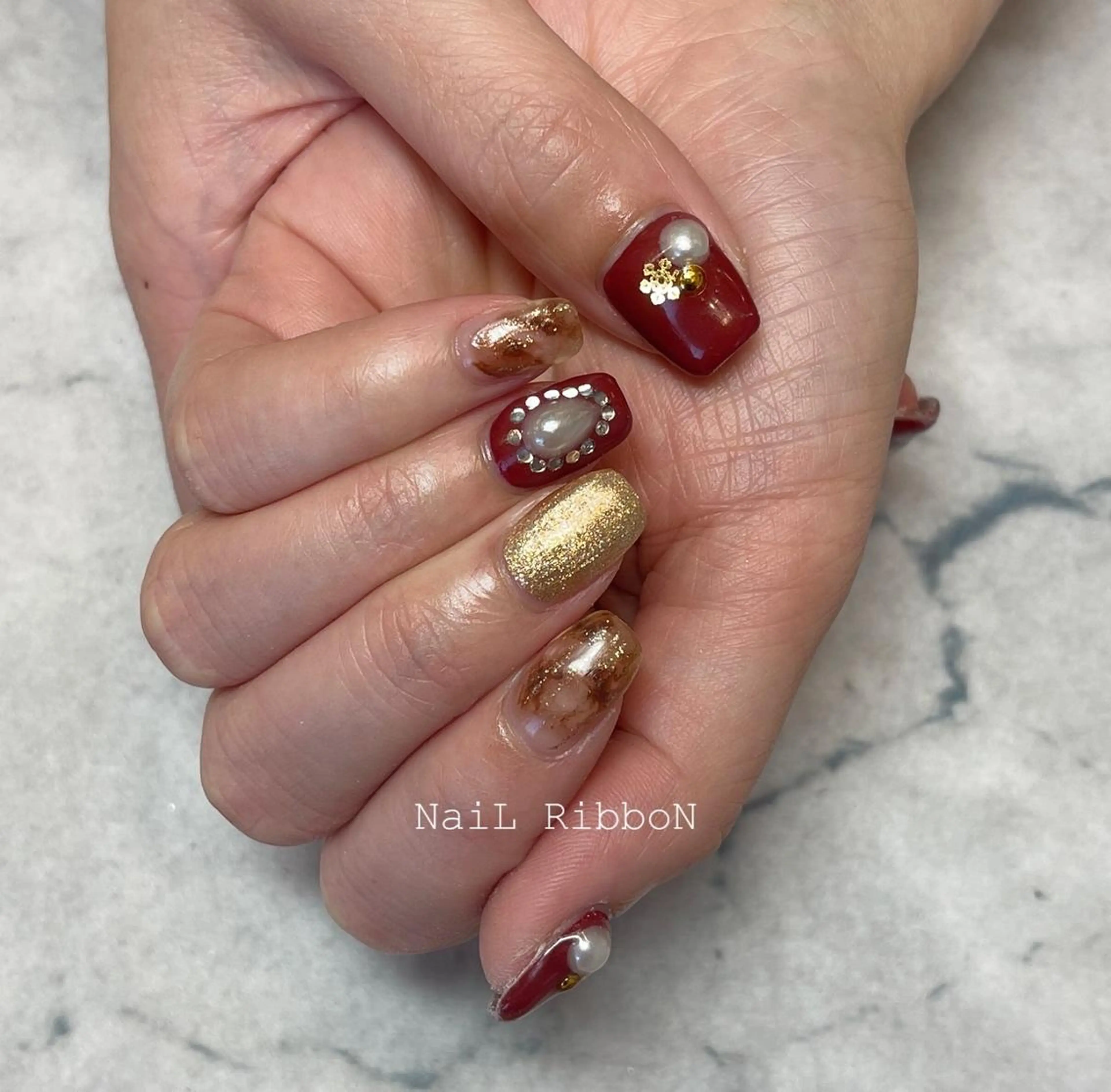ネイル ネイルリボン 受付スタッフのネイルデザイン