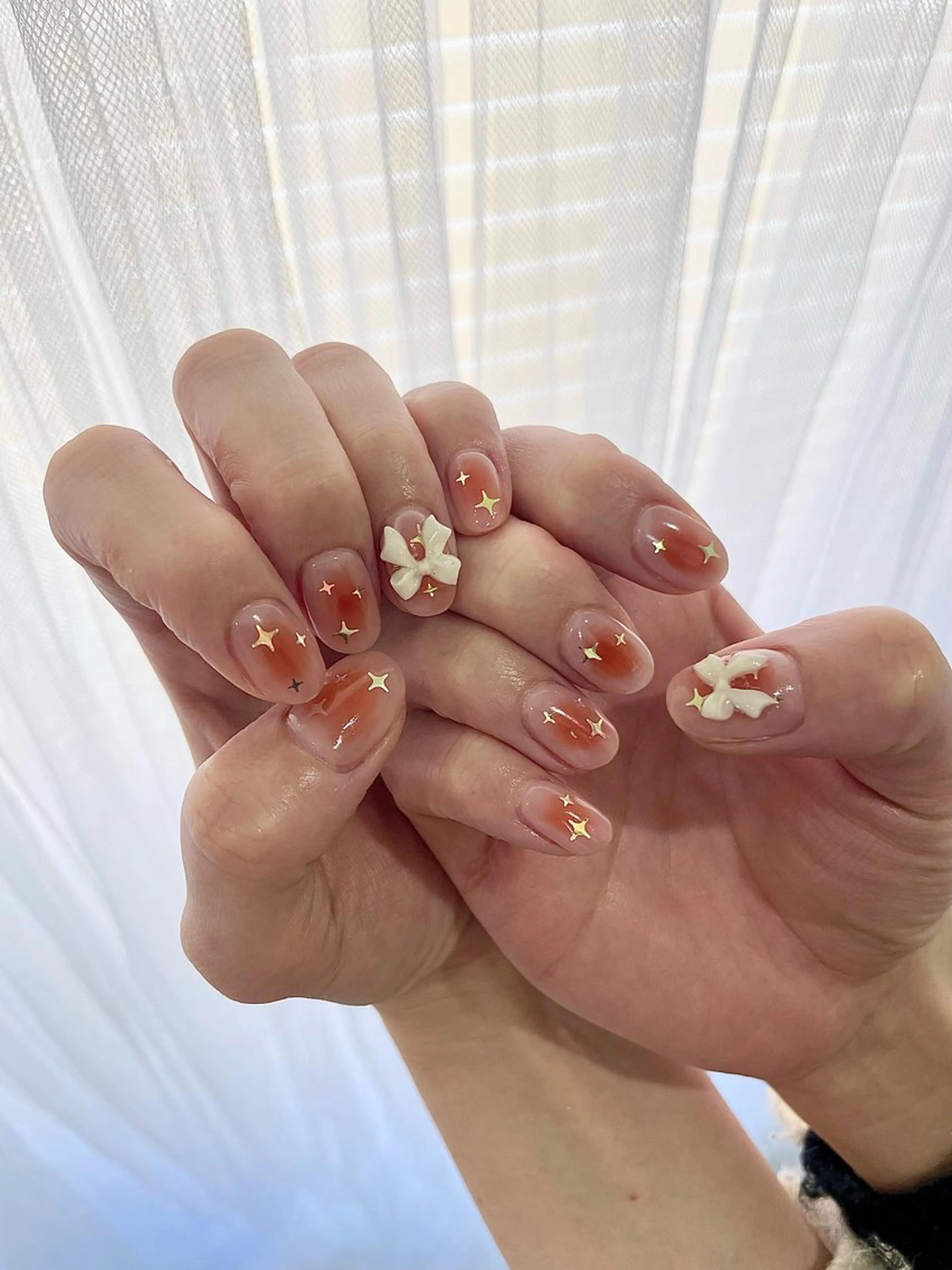 ネイル チークネイル リボン Ever Blue Nail Salonのネイルデザイン