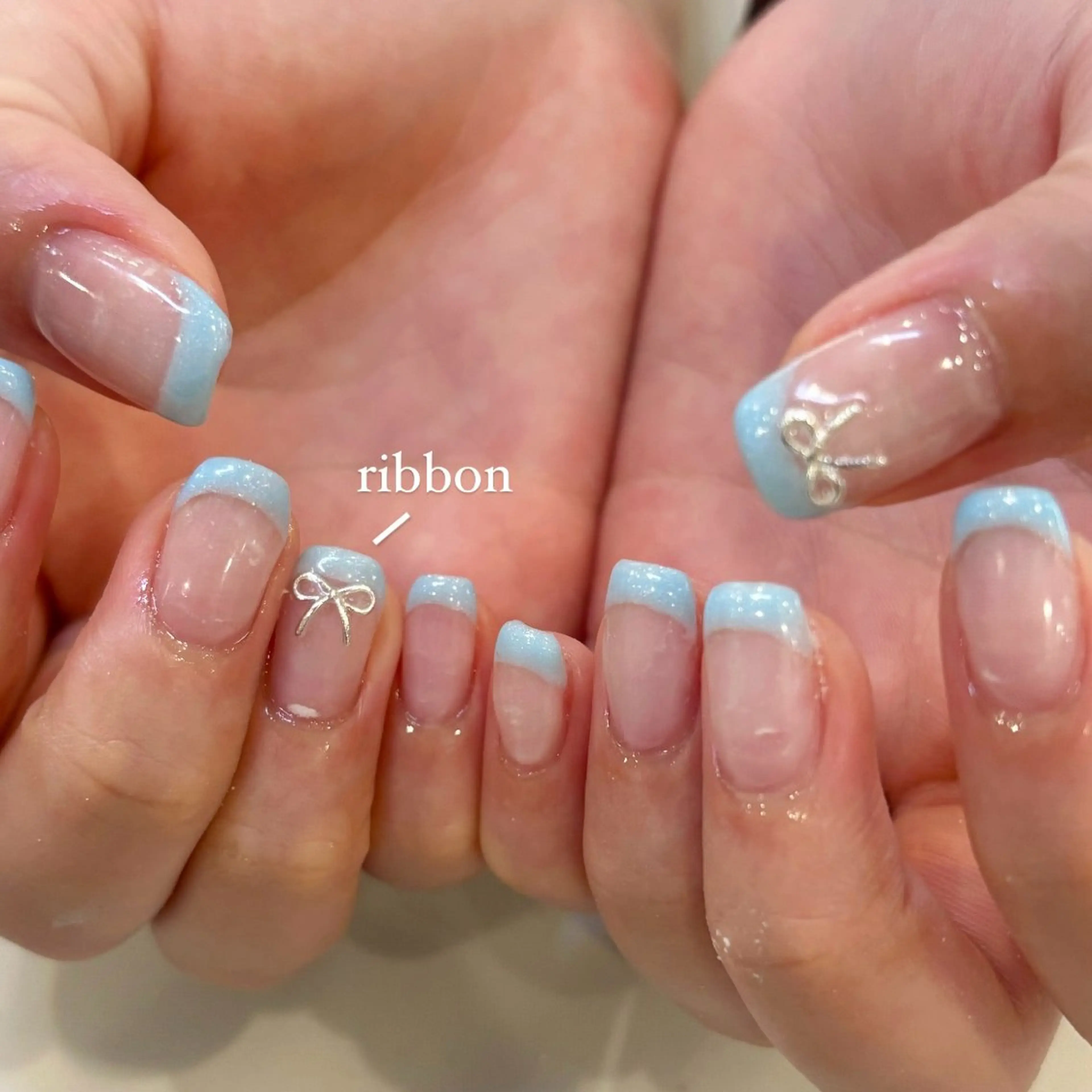 ネイル フレンチネイル 水色 リボン ハンドネイル millie ainee太田のネイルデザイン
