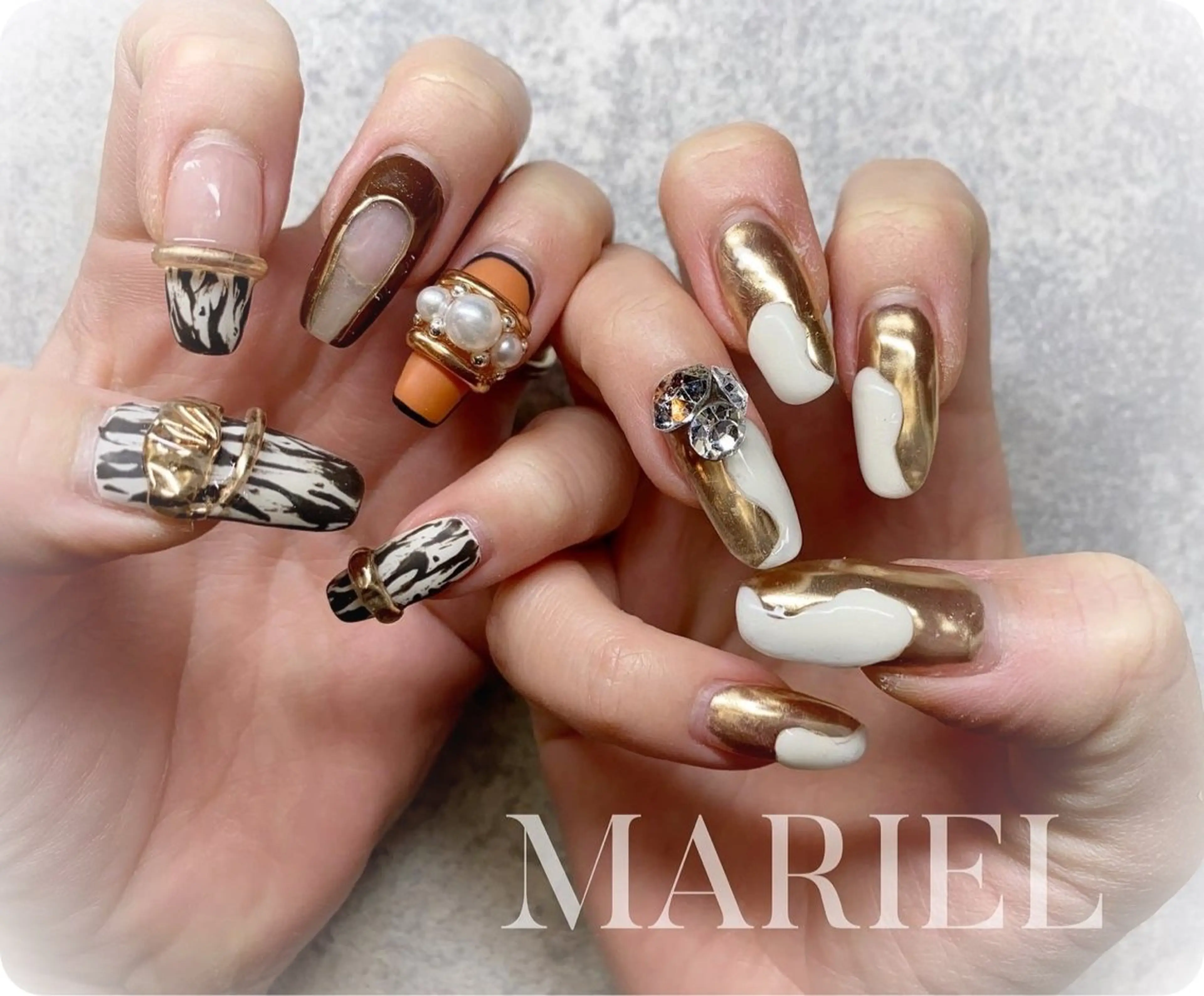 ネイル アニマル柄 ゴールド ミラーネイル ハンドネイル ネイルサロンMARIEL所属・nailist marieのネイルデザイン