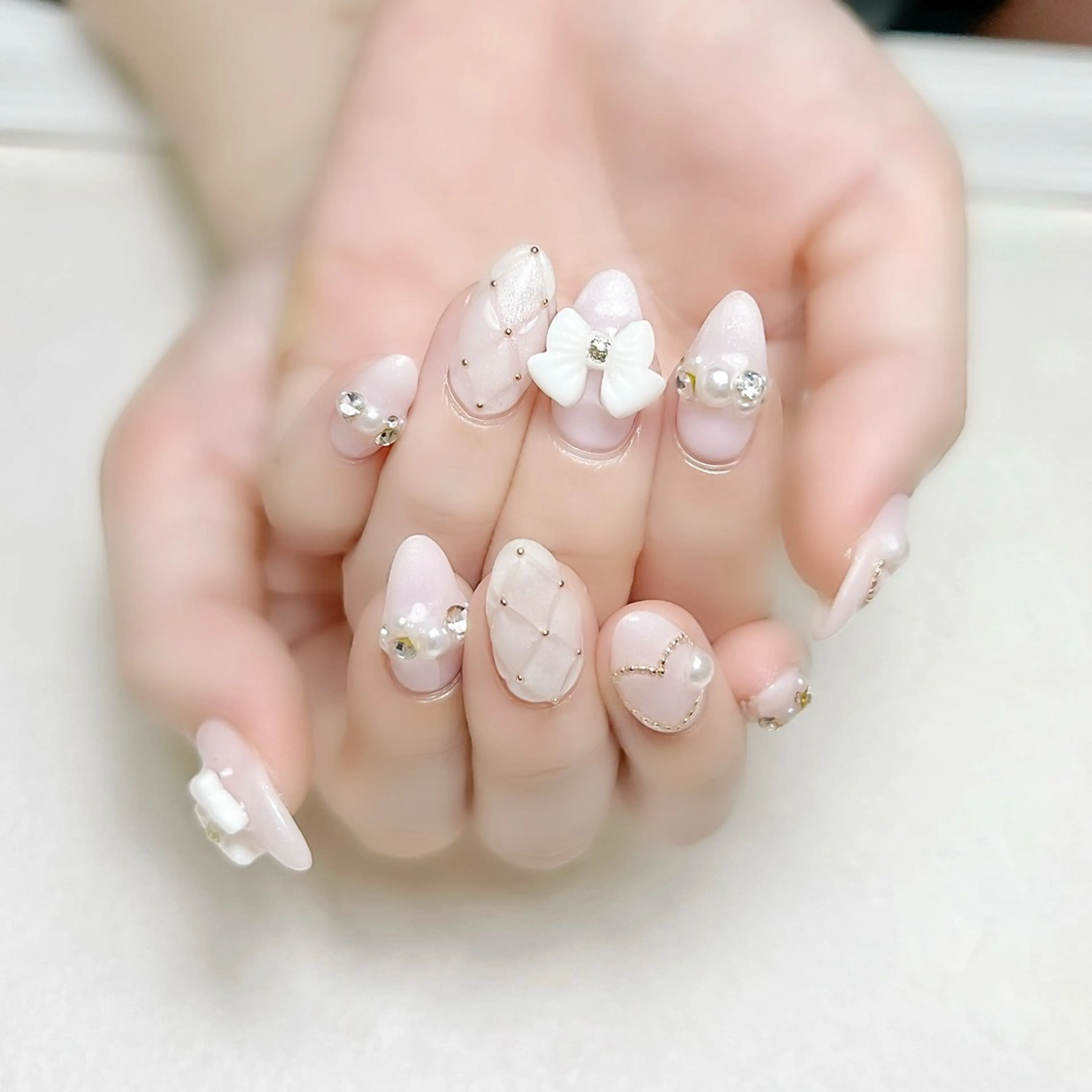 ネイル ガーリー キラキラネイル ピンク リボン 春ネイル rouse nail RISATOのネイルデザイン