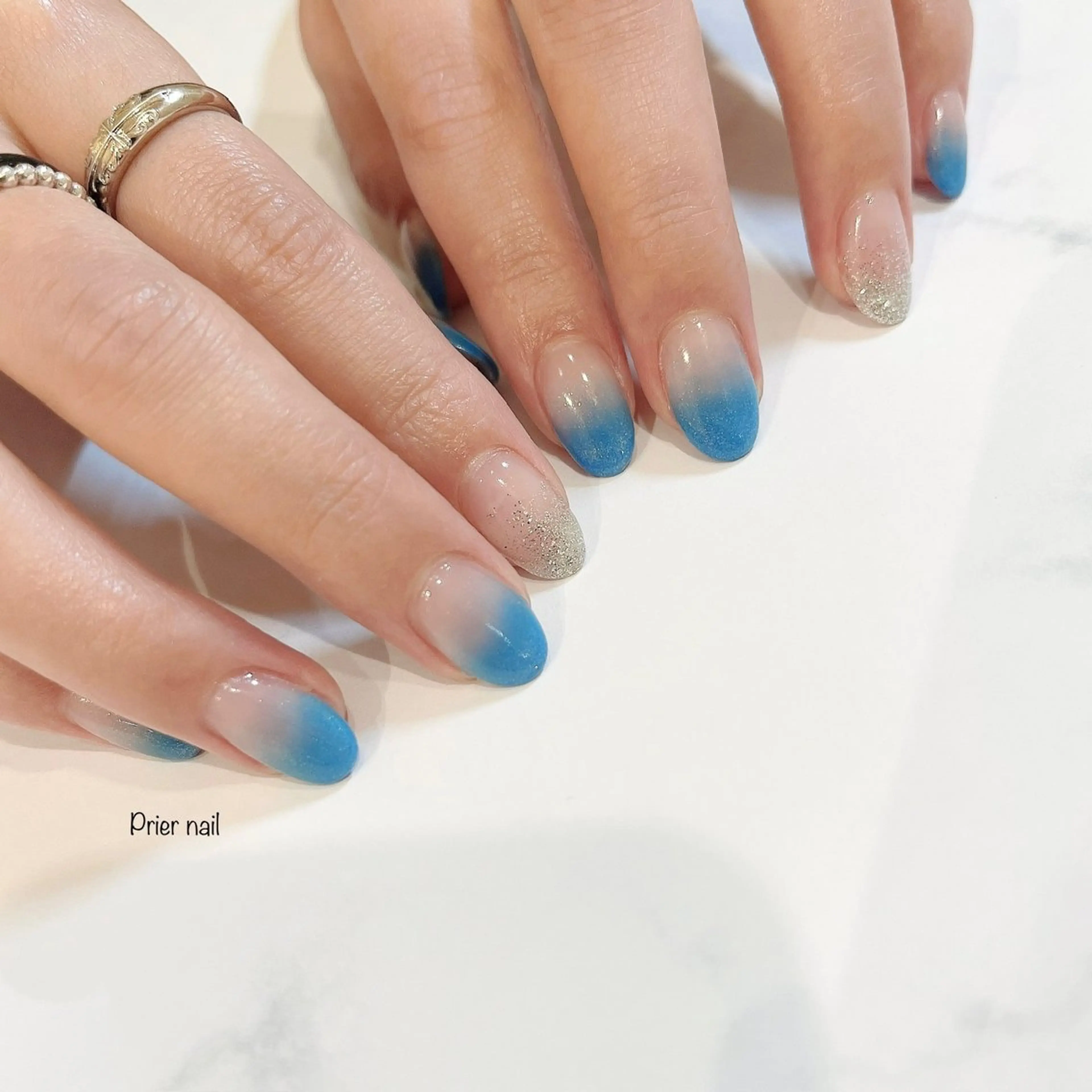 ネイル ブルー キラキラネイル ハンドネイル Prier×Kew hair所属・Prier nailのネイルデザイン