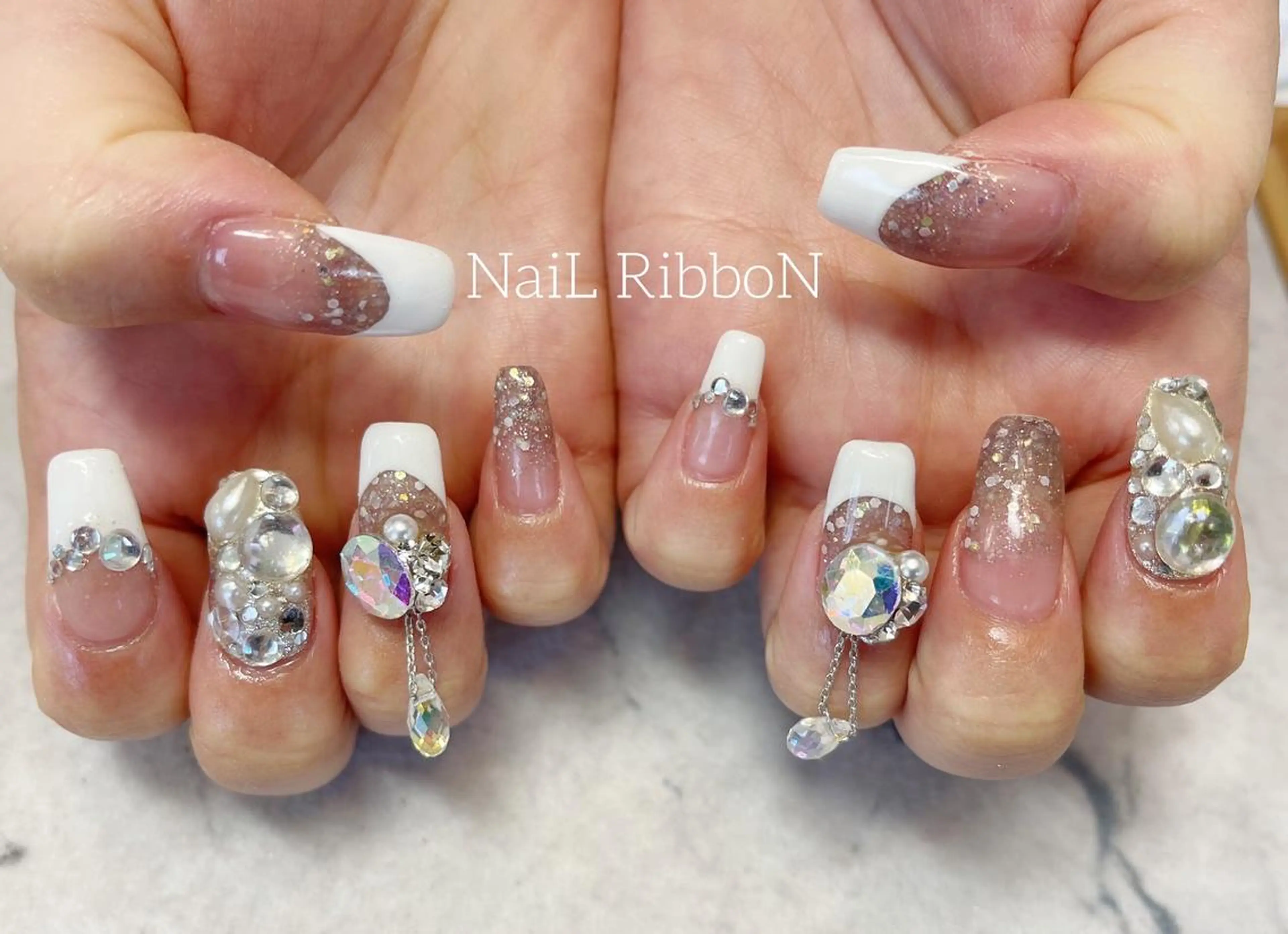 ネイル ネイルリボン 受付スタッフのネイルデザイン
