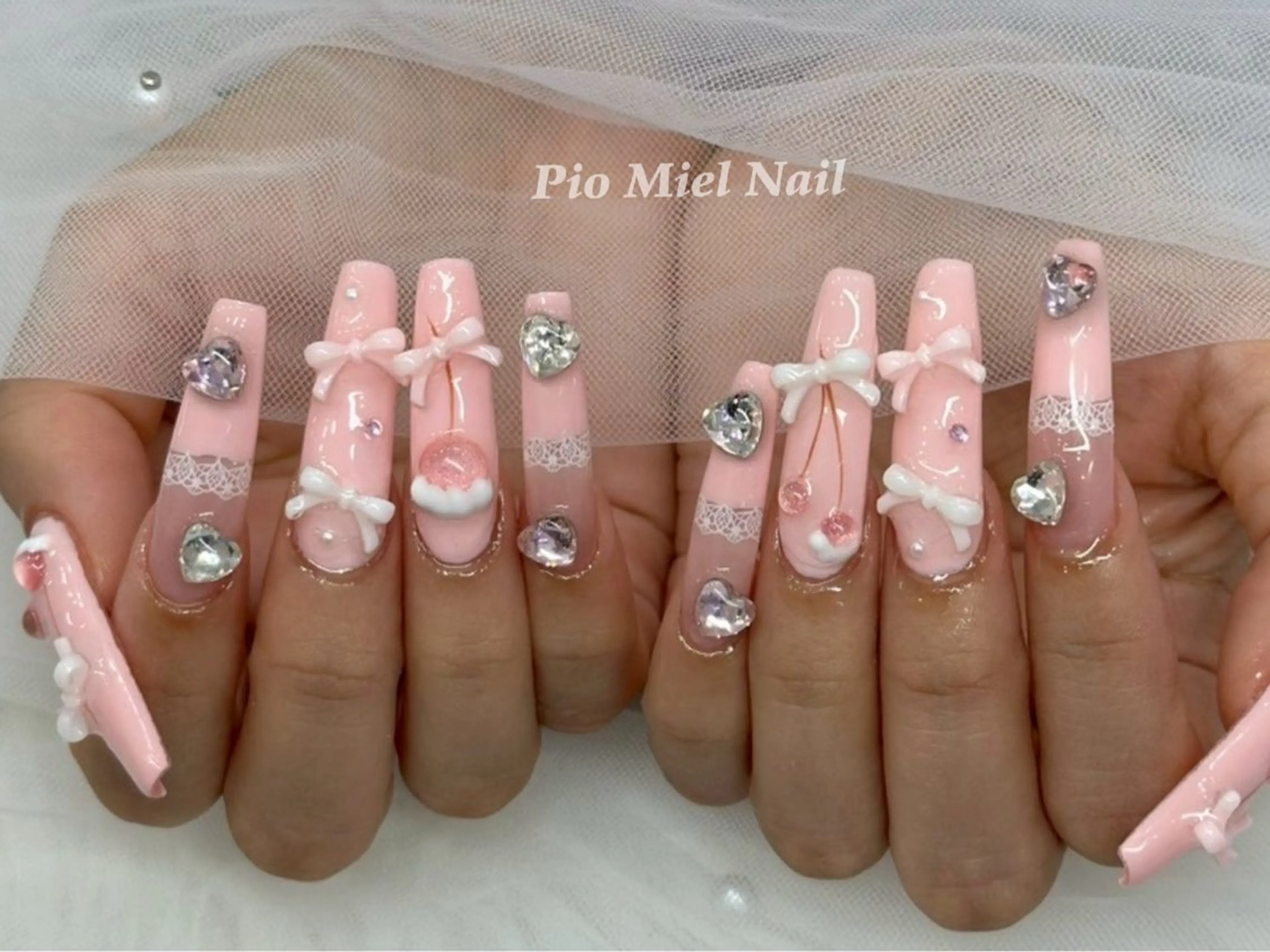 ロング 韓国風ヘア ハンドネイル ハンドケア Pio Mielのネイルデザイン