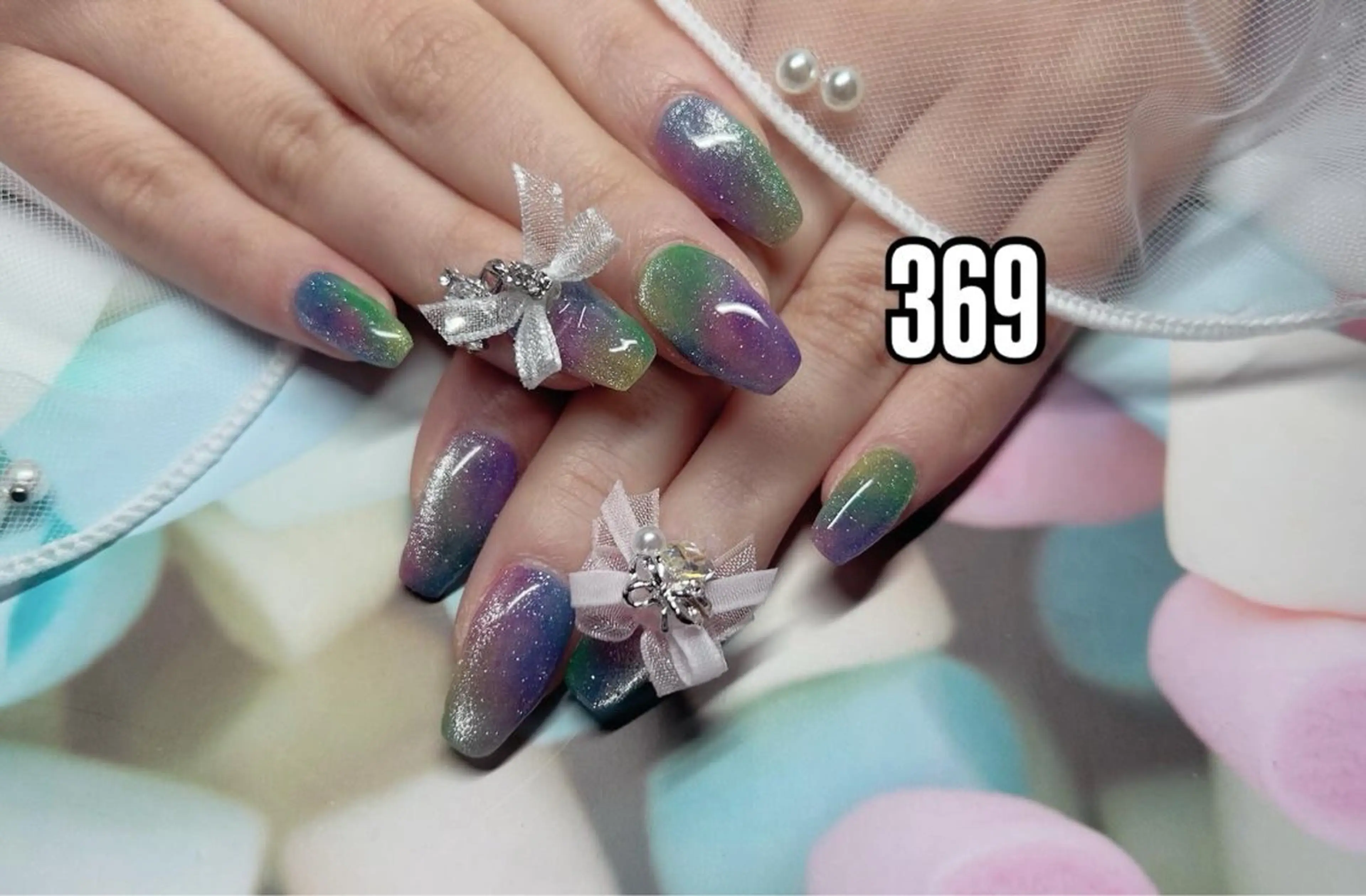 ネイル リボン 古川 真理枝のネイルデザイン