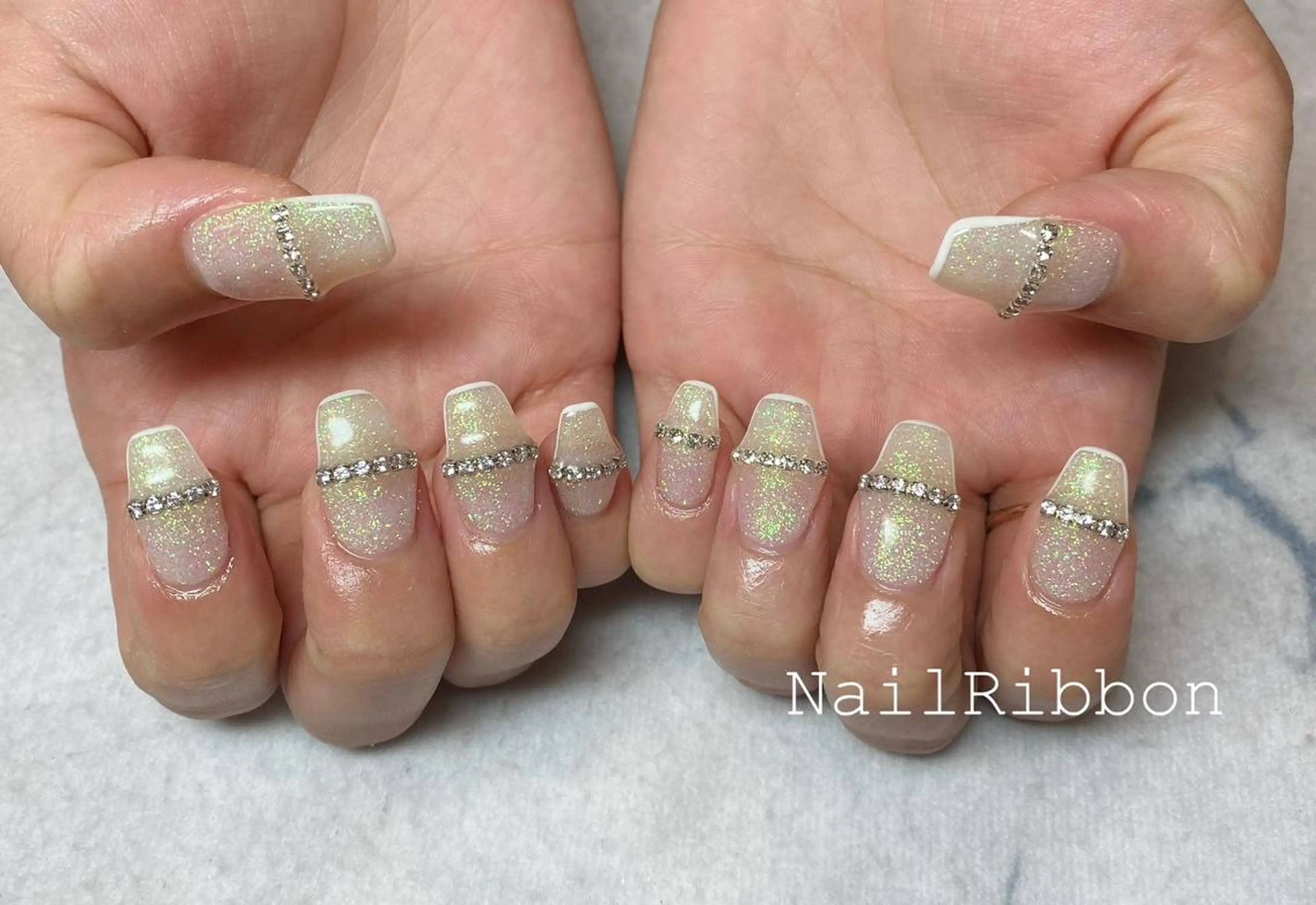 ネイル ネイルリボン 受付スタッフのネイルデザイン