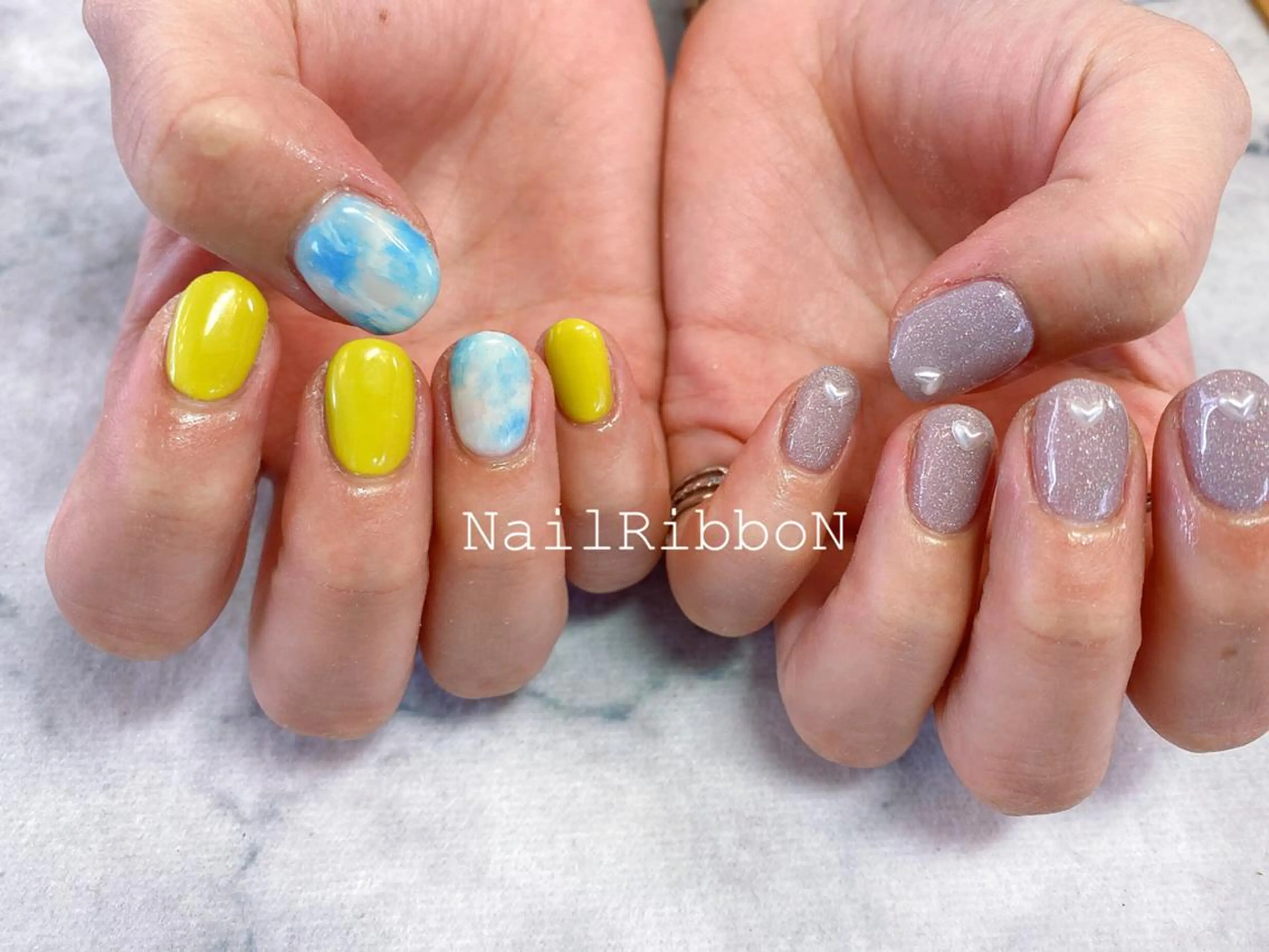 ネイル ネイルリボン 受付スタッフのネイルデザイン