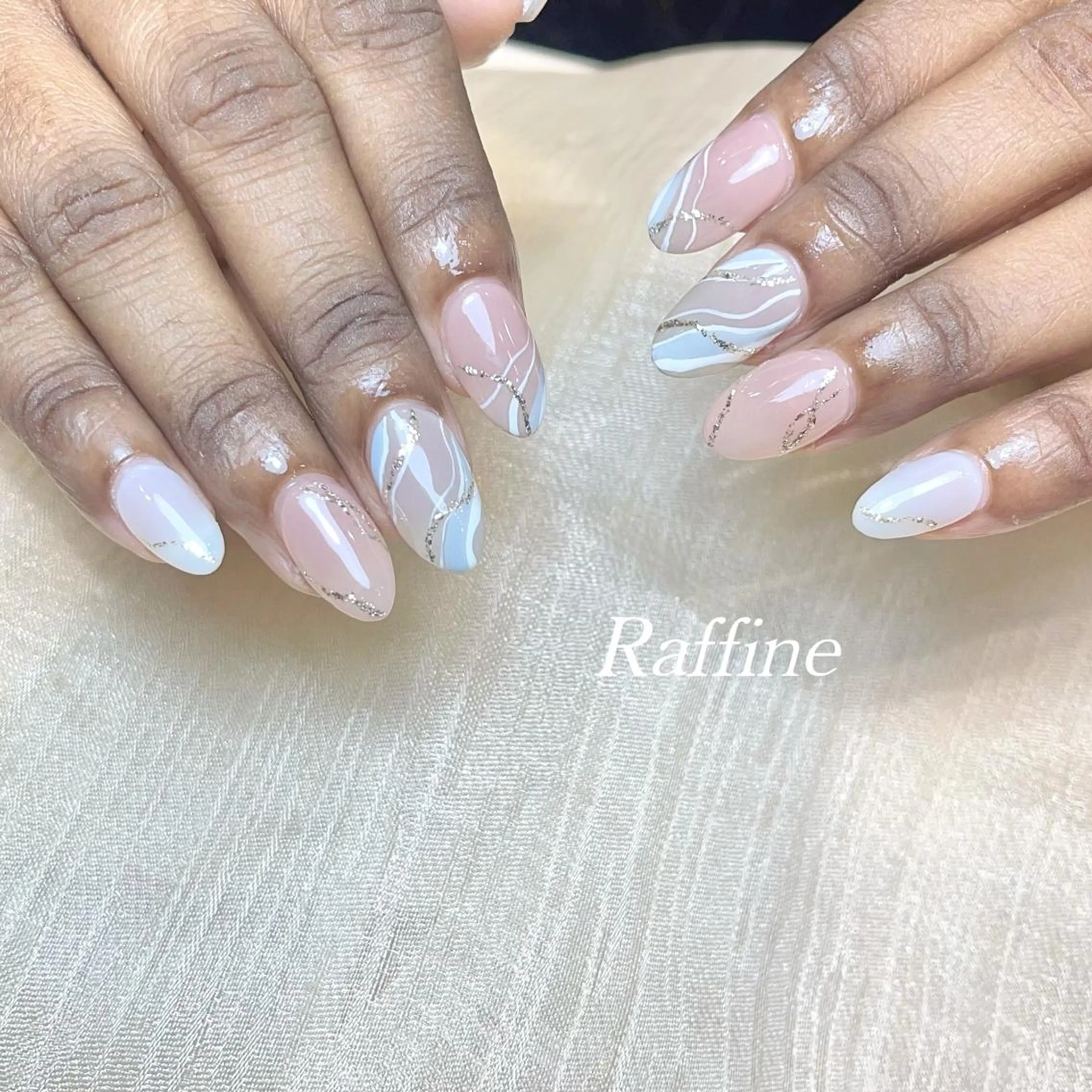 ネイル RAFFINE 月🦋🩵のネイルデザイン