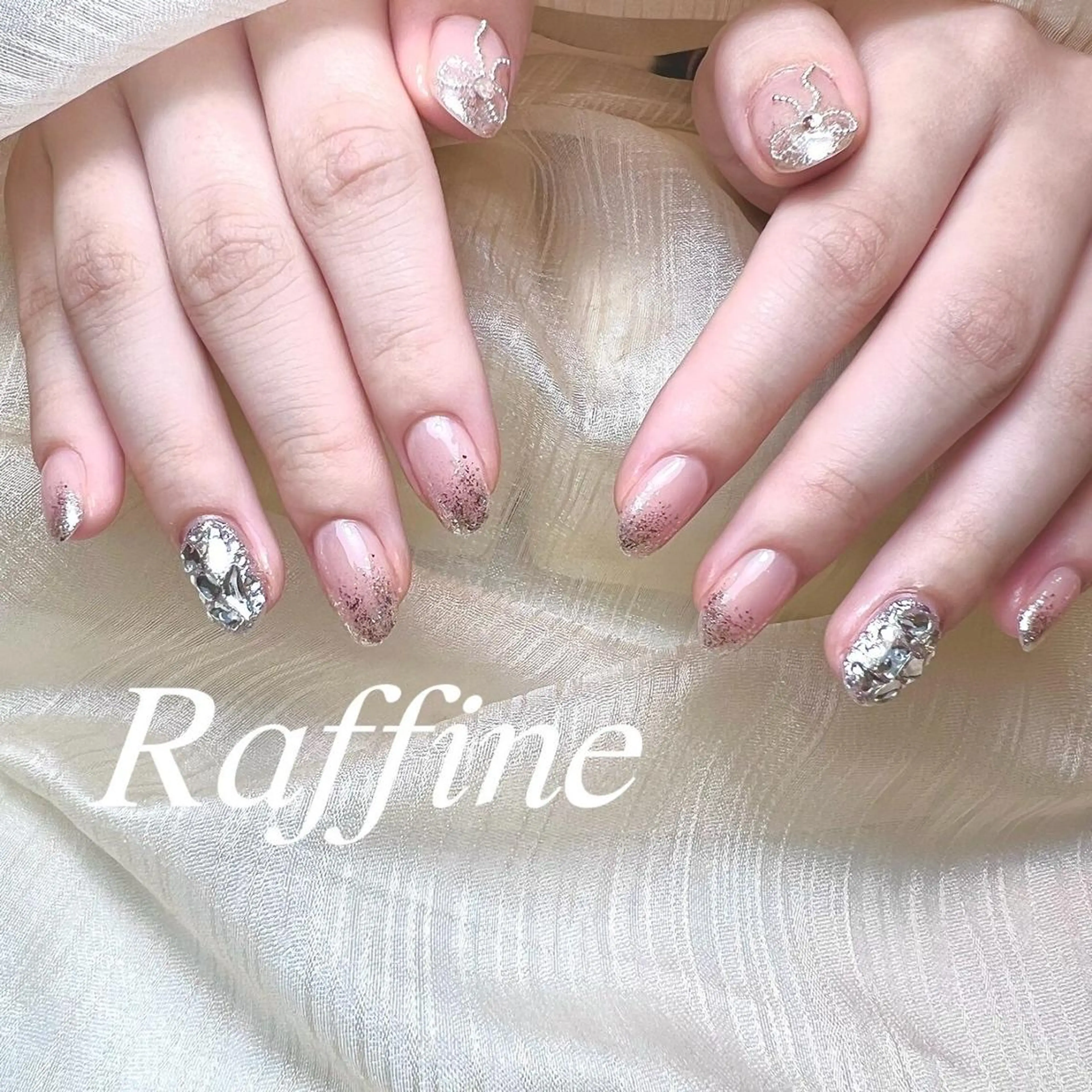 ネイル RAFFINE 月🦋🩵のネイルデザイン