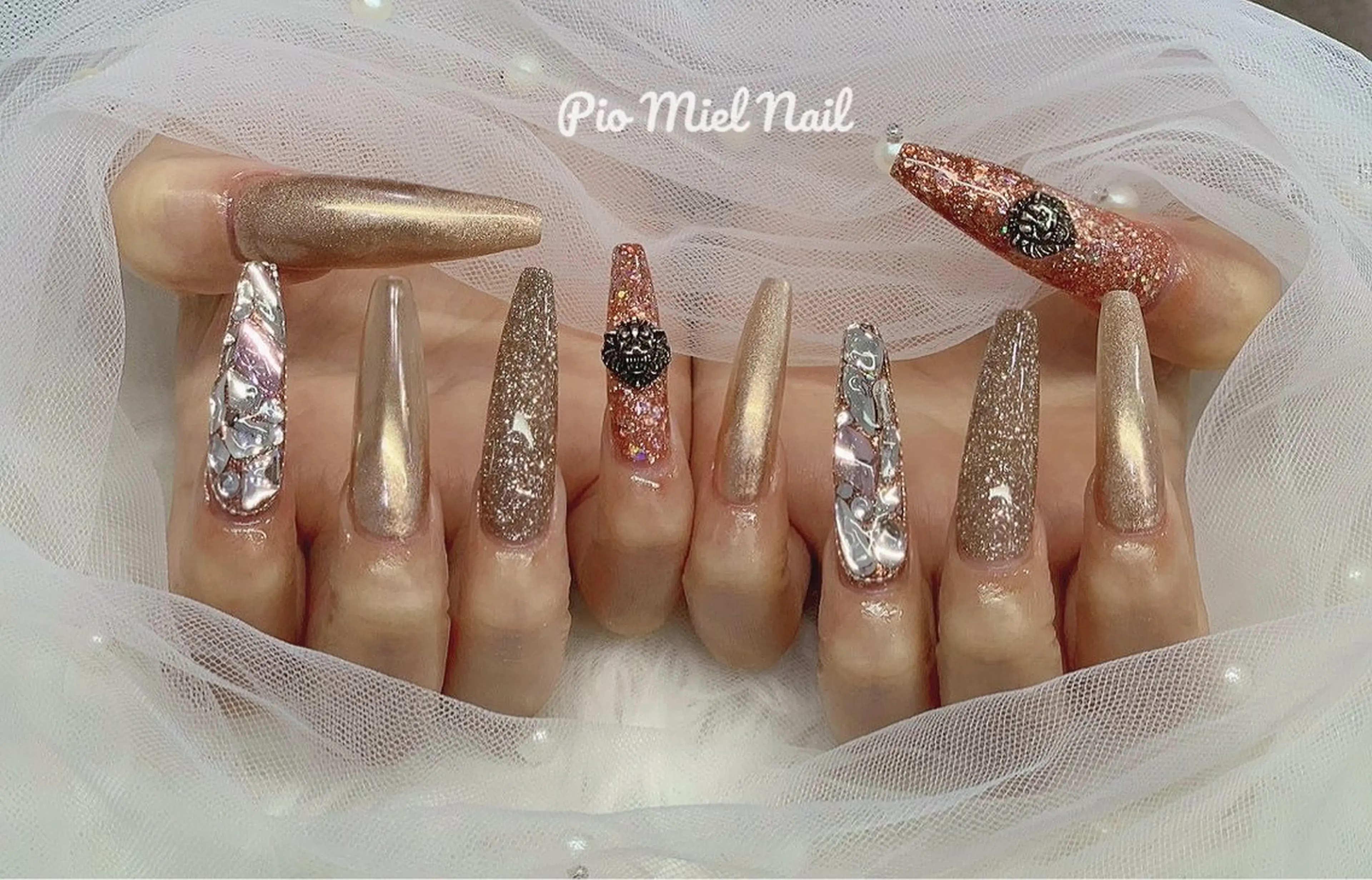 ロング ハンドネイル ハンドケア Pio Mielのネイルデザイン
