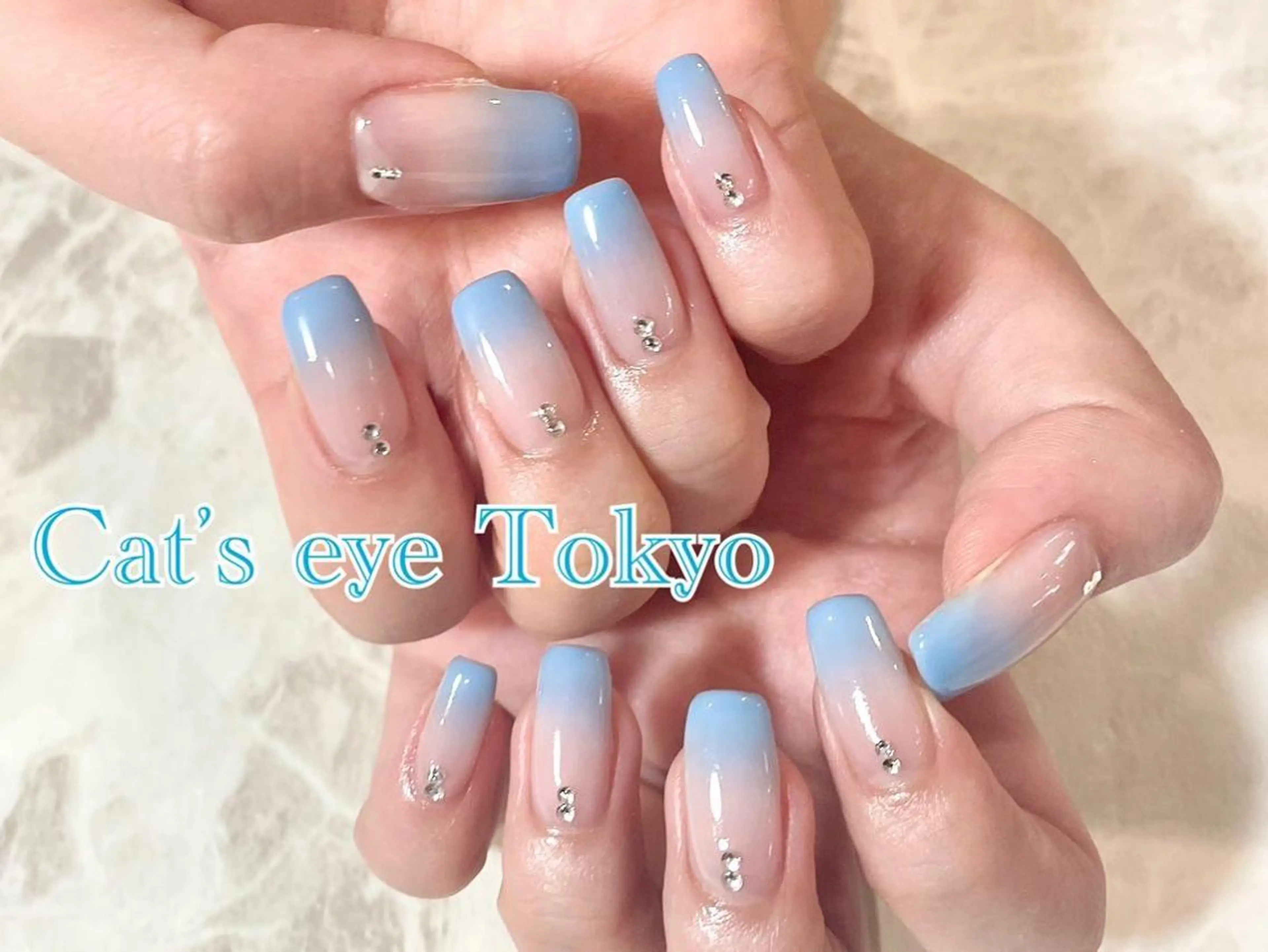 ネイル マツエク・マツパ グラデーション ストーンネイル Cat's eye TOKYO 新宿店のネイルデザイン