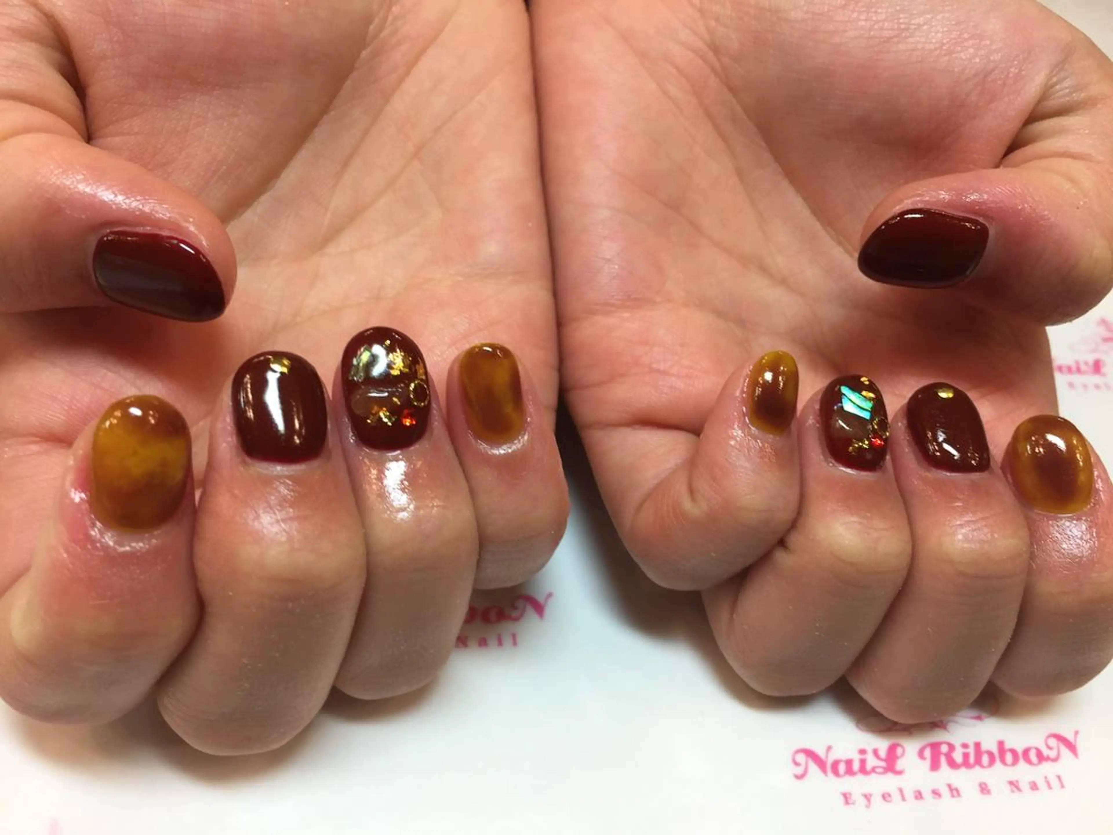 ネイル ネイルリボン 受付スタッフのネイルデザイン