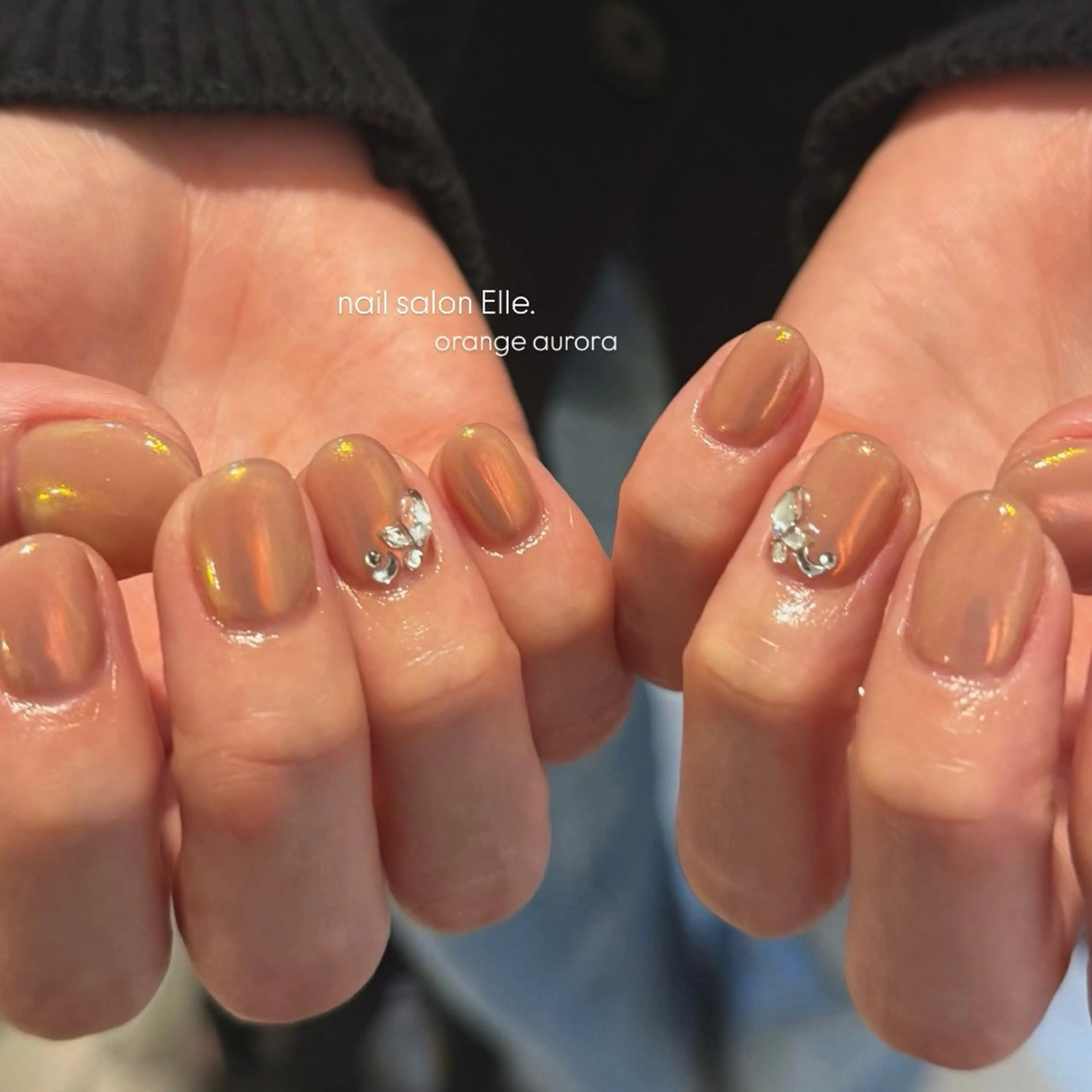 ネイル オーロラネイル キラキラネイル オレンジ ストーンネイル Elle.所属・Elle. HINATAのネイルデザイン